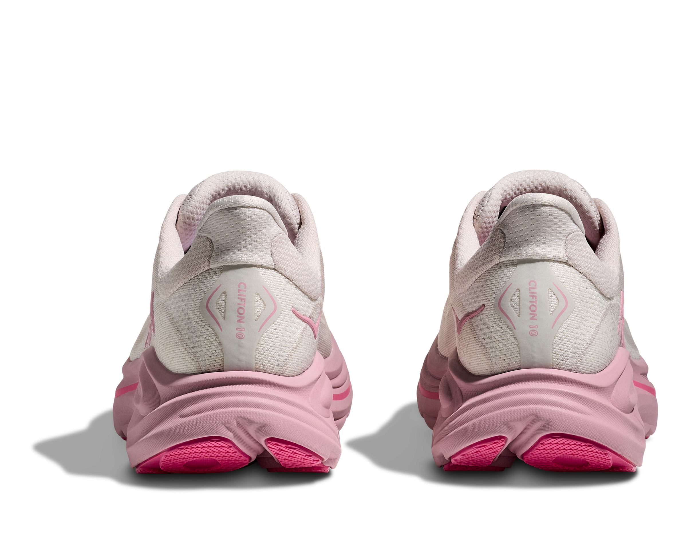 Pair of pink running shoes on a white background