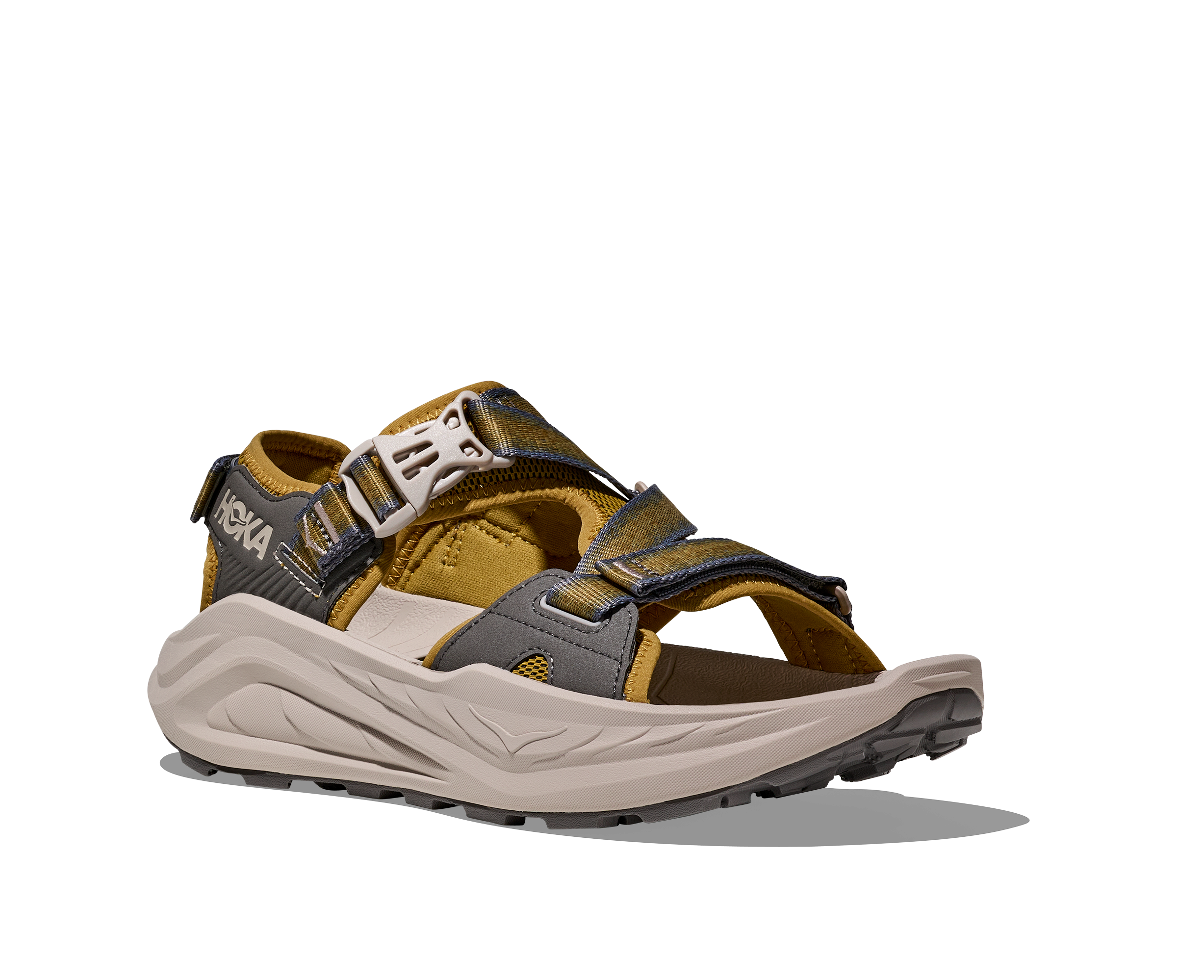 Sandal with multiple straps and a white sole on a white background