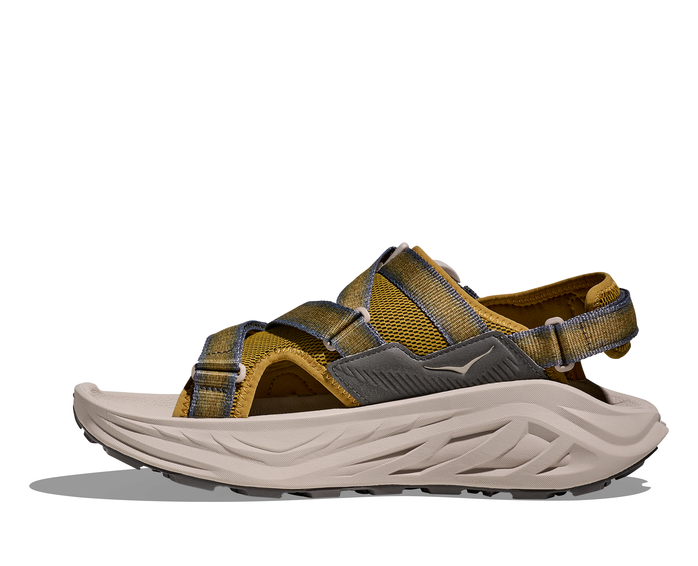 Brown and gray sandal with a white sole on a white background