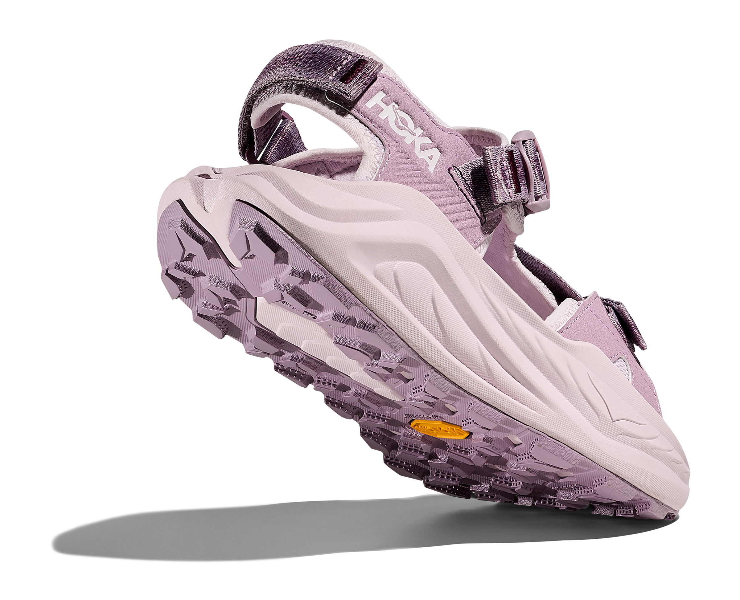 Purple sandal with transparent sole on a white background