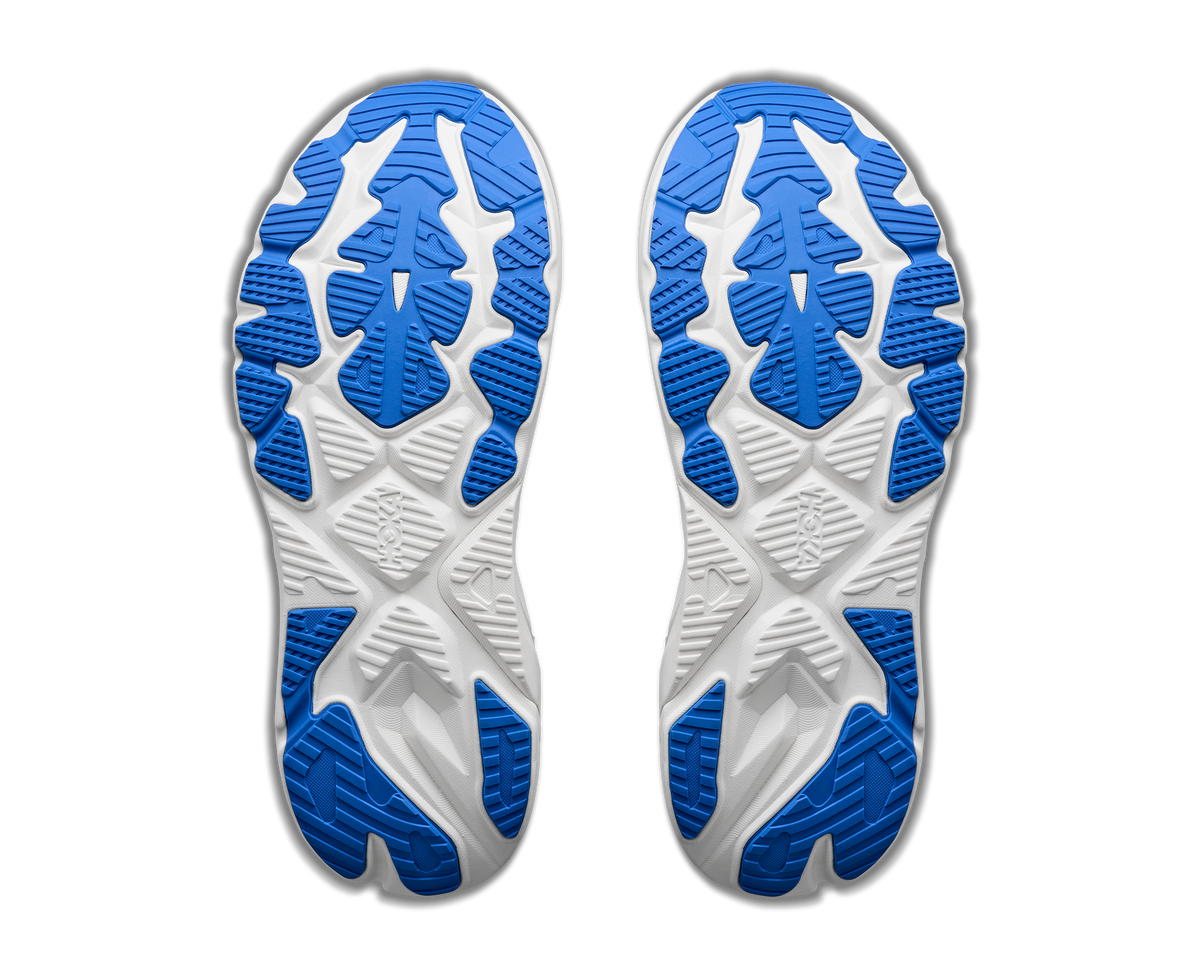 White and blue shoe soles on a white background