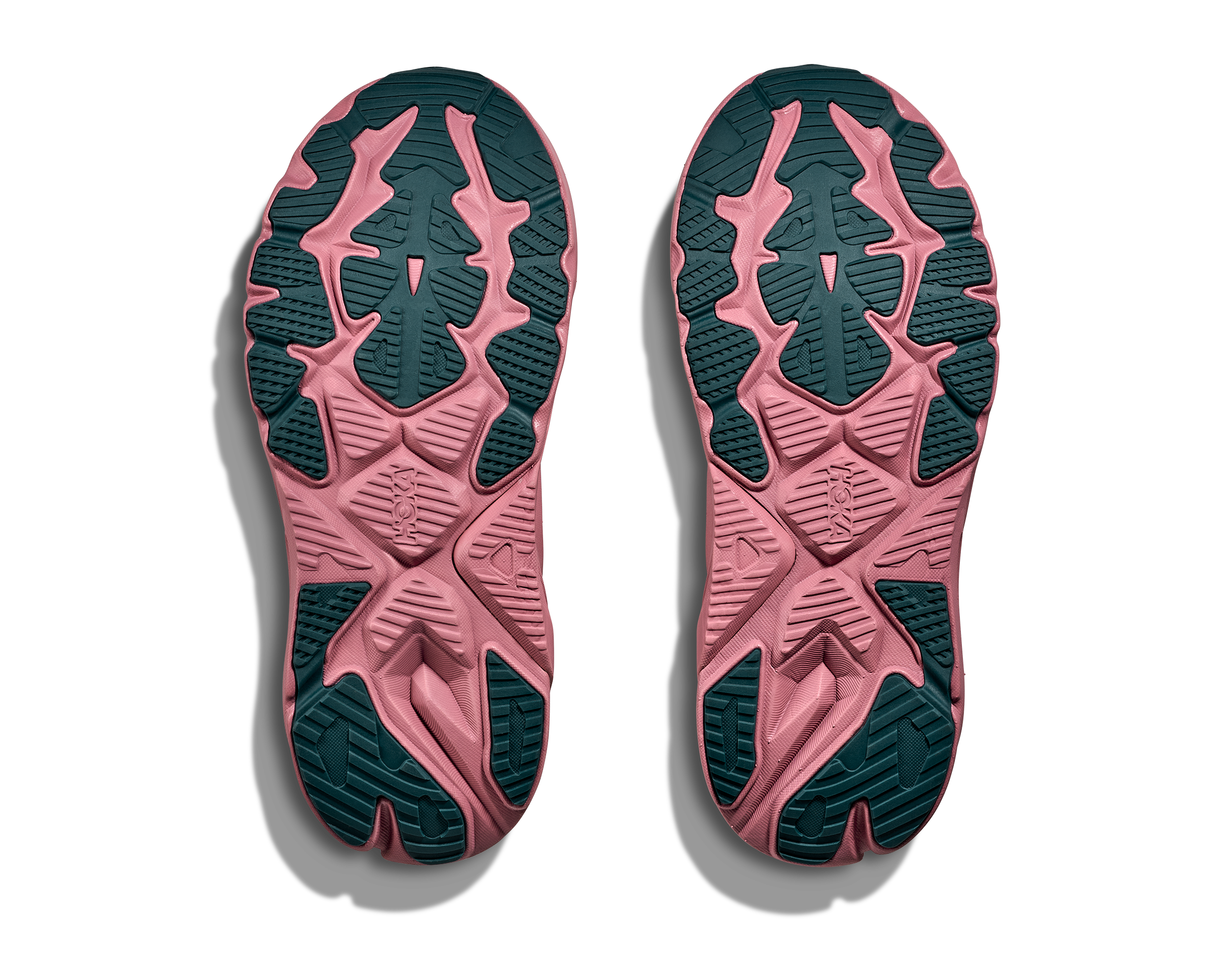 Pink and green sole of a shoe with a clear background