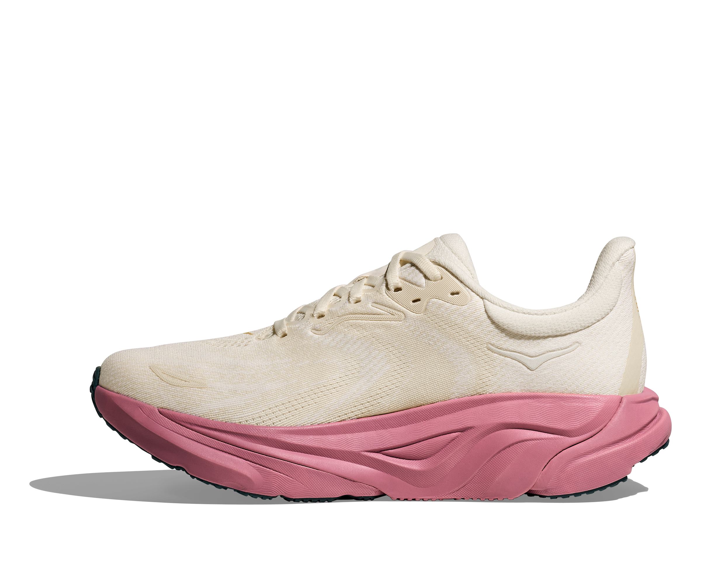 White sneaker with a pink sole on a transparent background