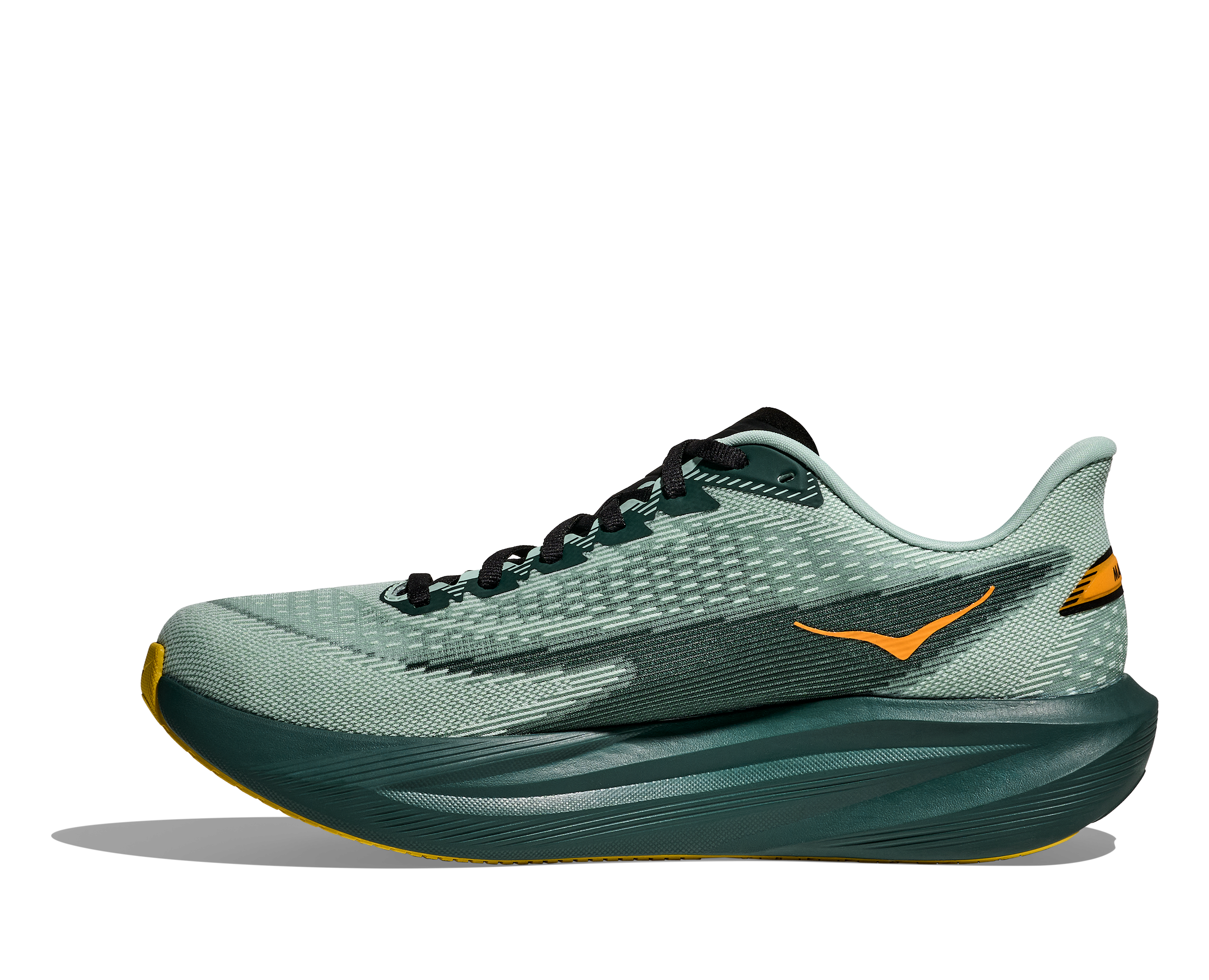 Green running shoe with orange accents on a white background