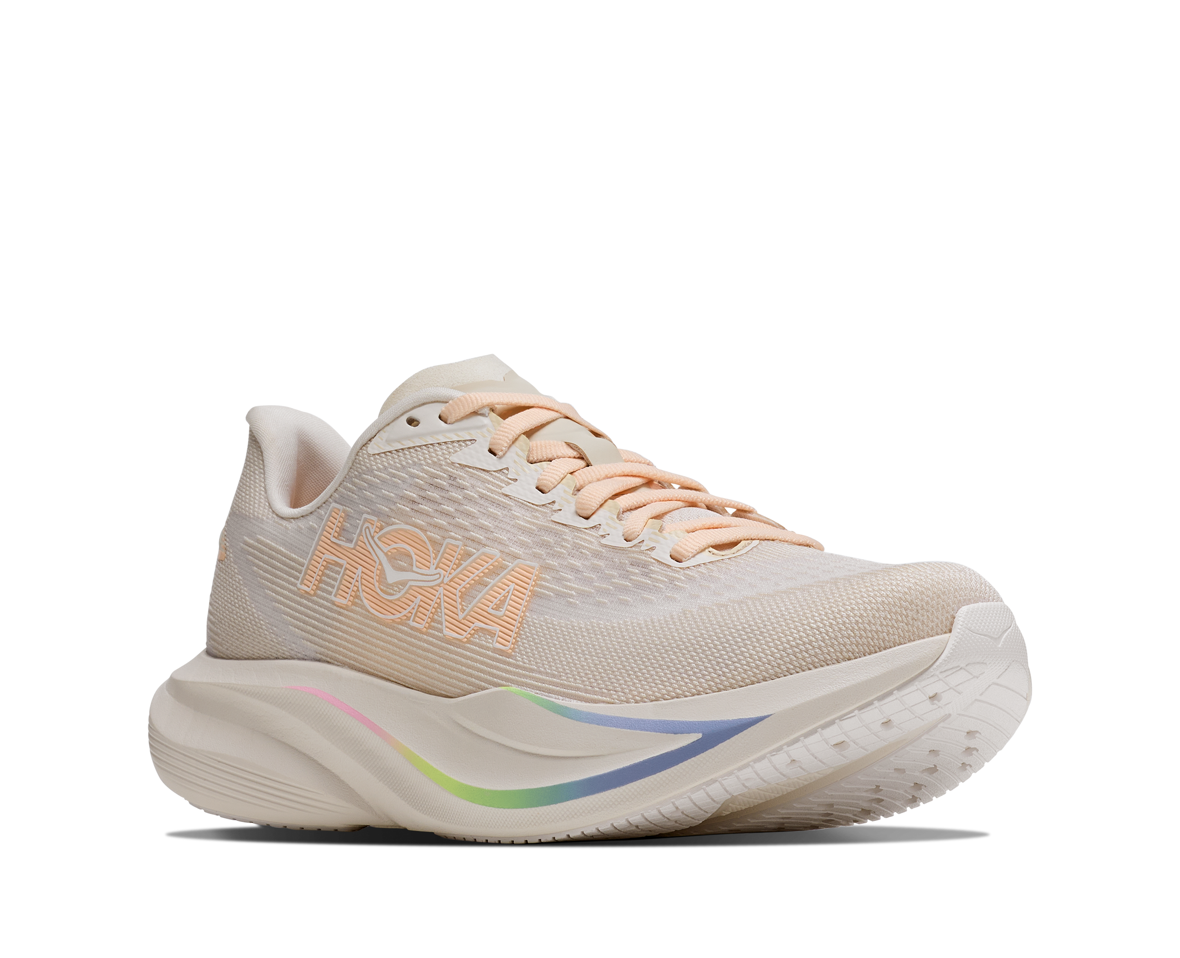 Beige running shoe with colorful sole on a white background