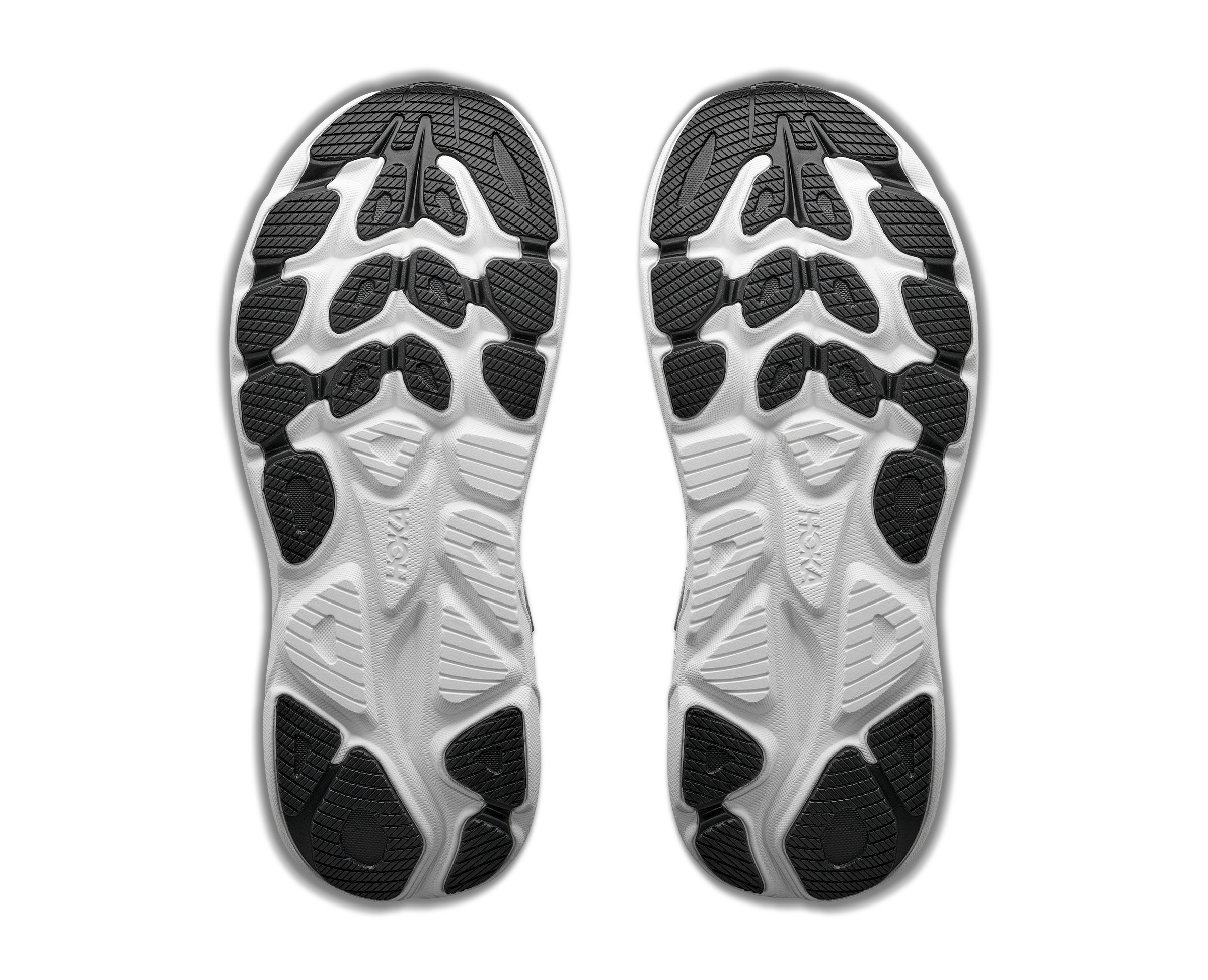Black and white sole of a shoe with brand logo on a white background