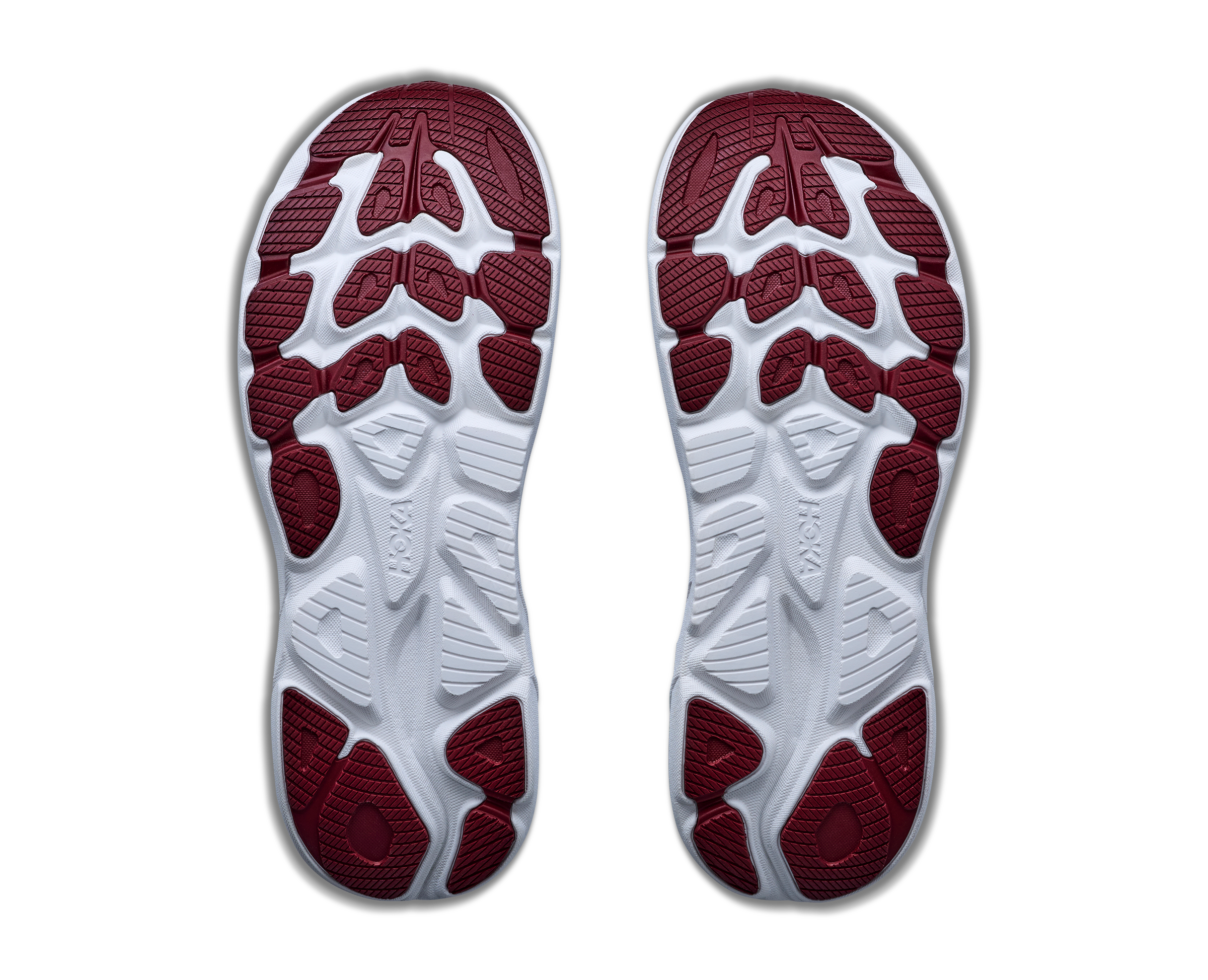 White shoe insoles with red pattern on a white background