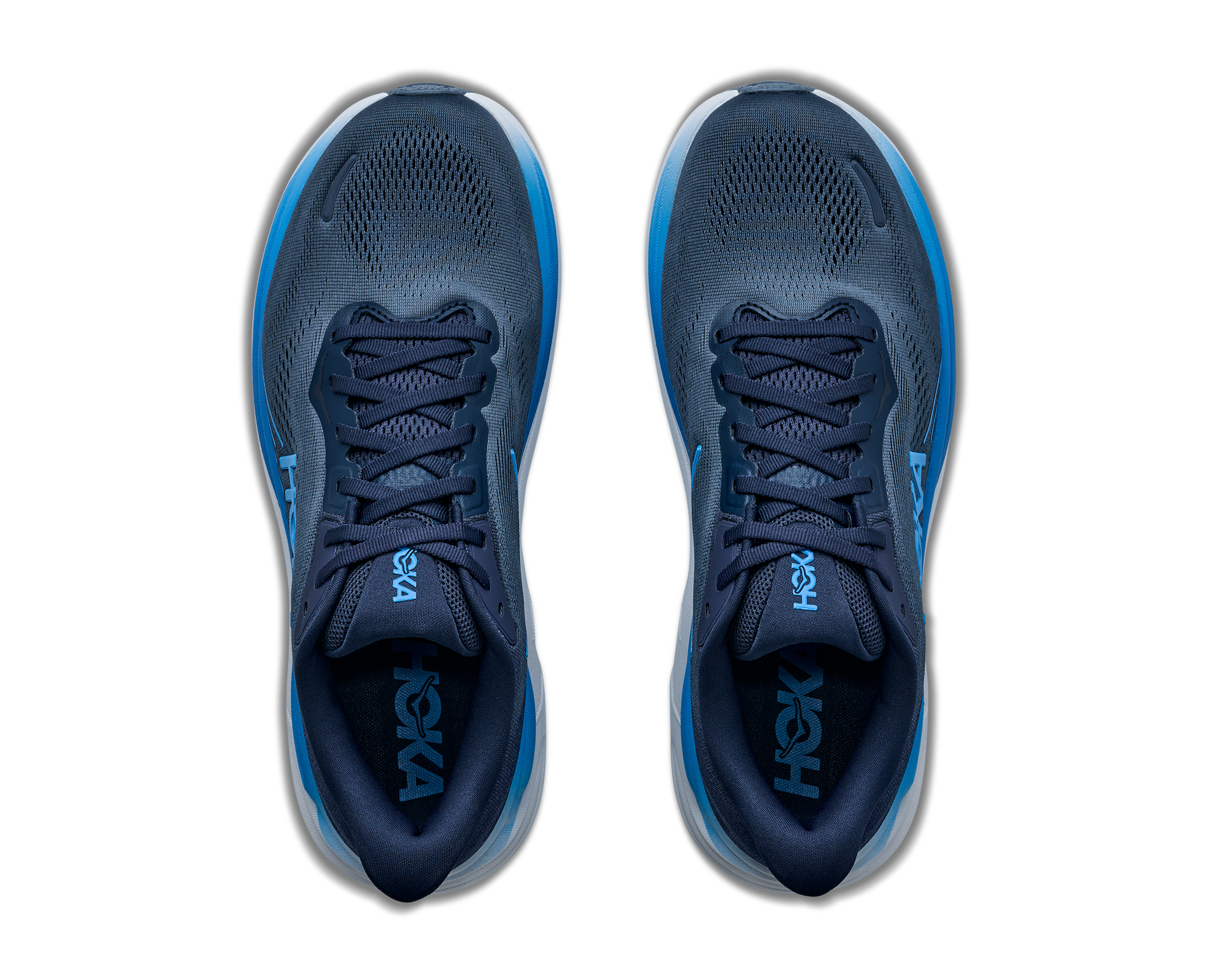 Pair of blue running shoes with white soles on a transparent background