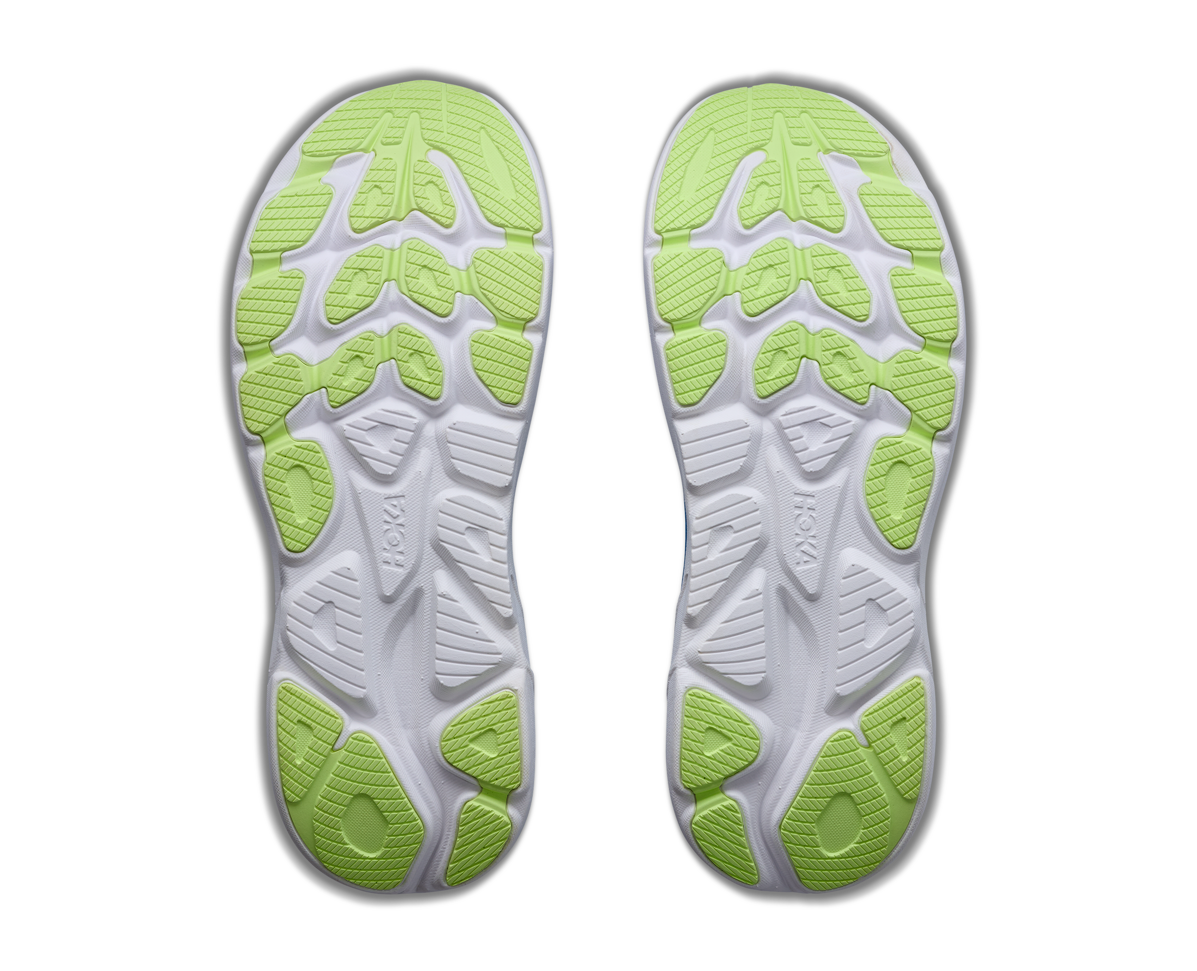 White and green sole of a shoe on a black background