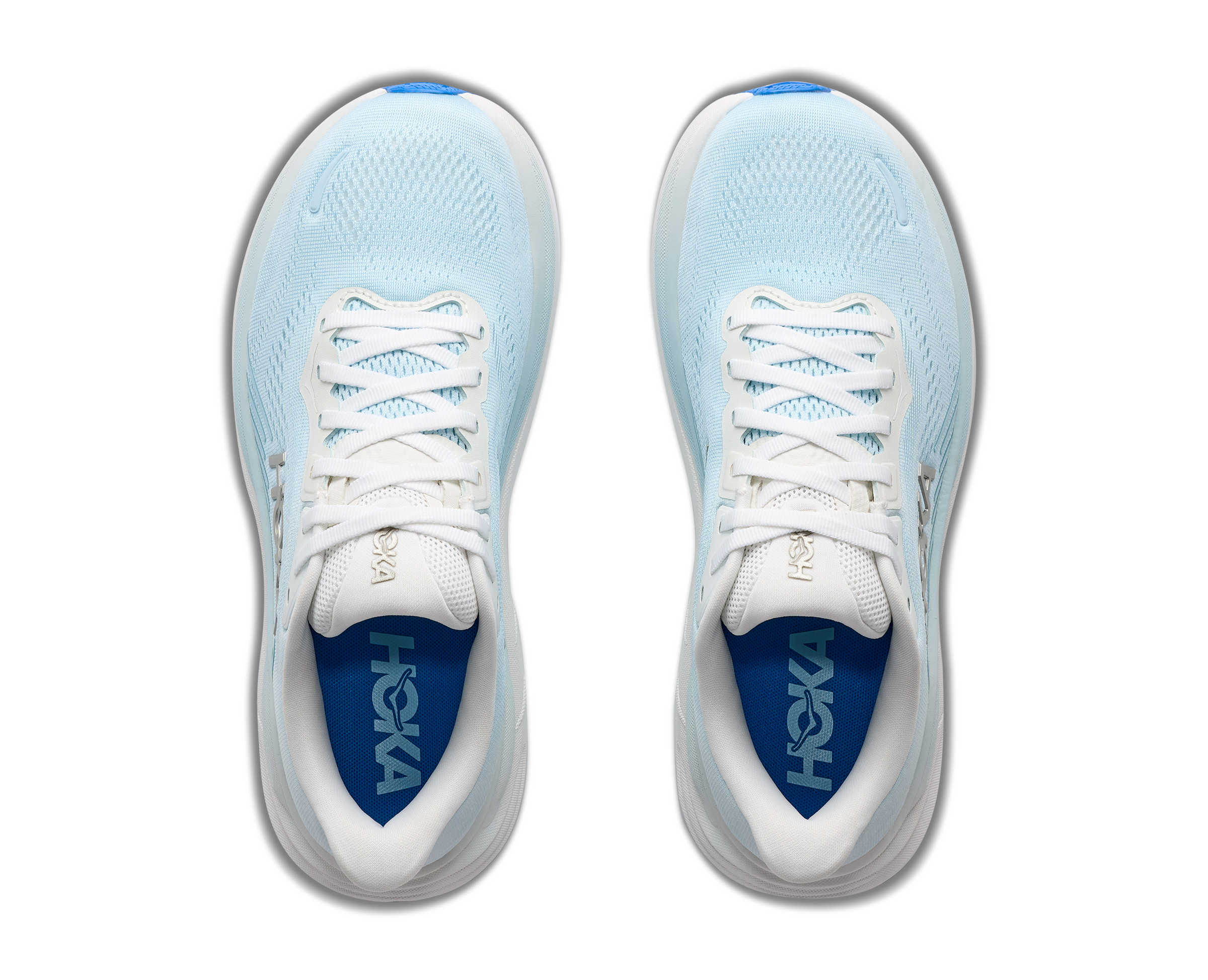 Light blue running shoes with white laces on a white background