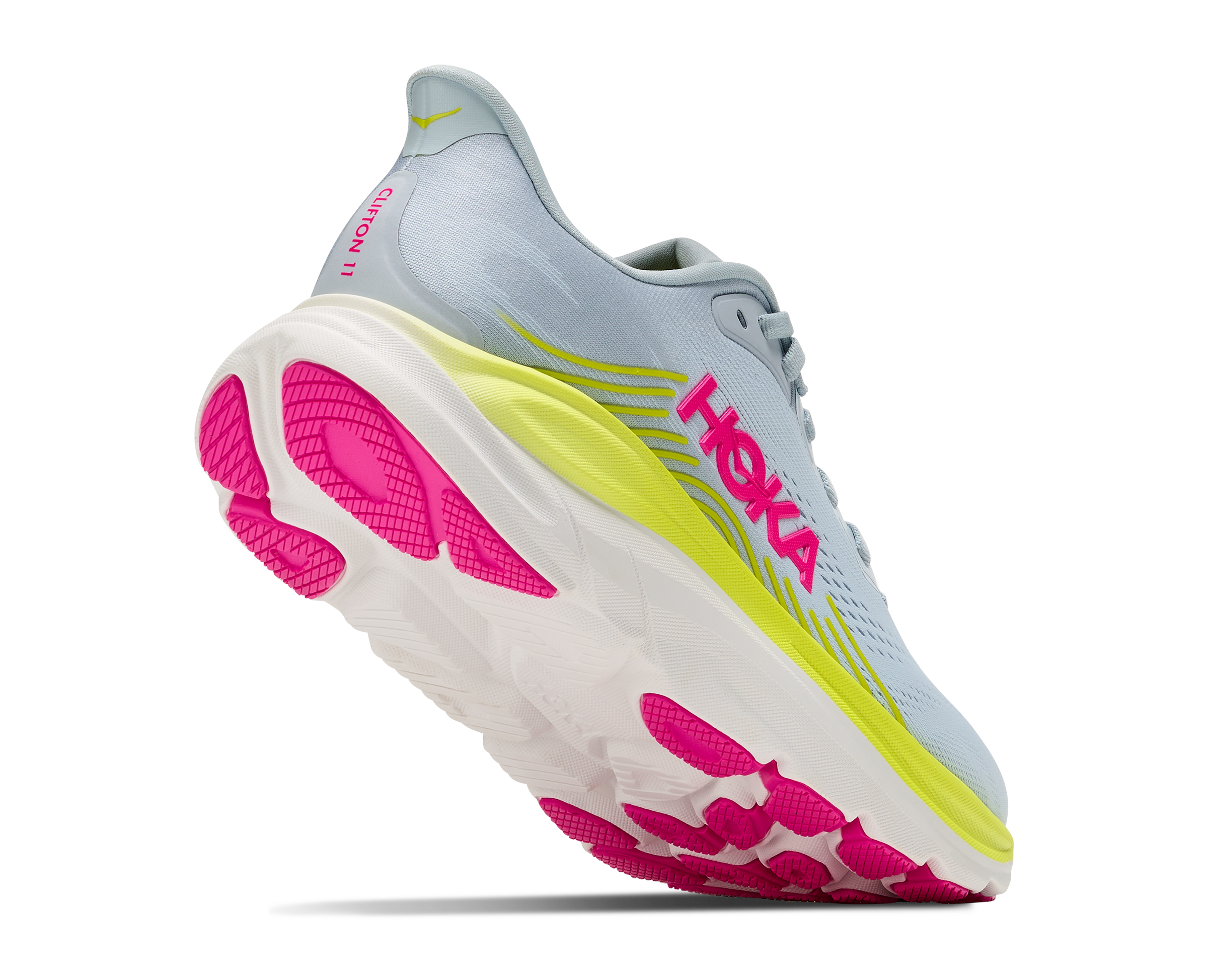 Hoka running shoe with pink and yellow sole on a white background
