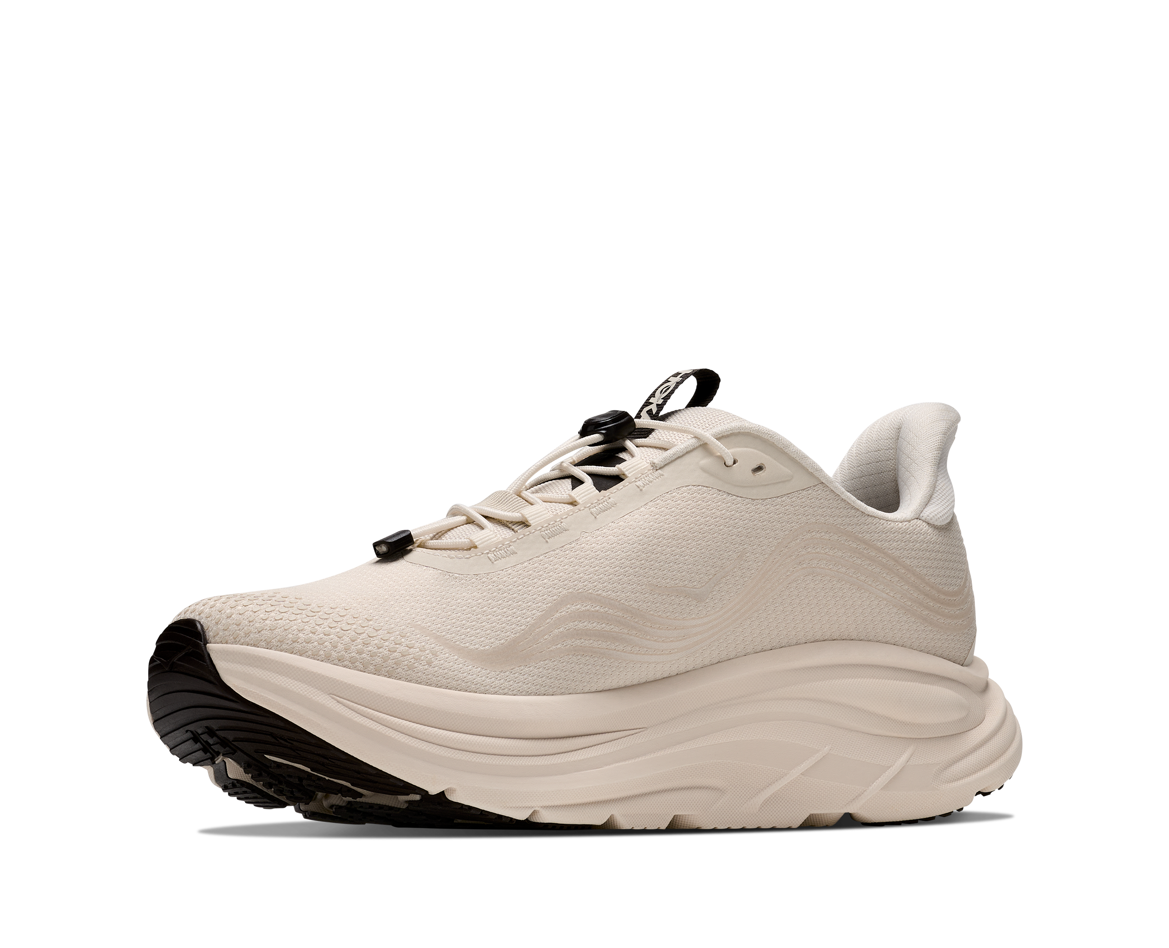 Beige running shoe with a thick sole on a white background