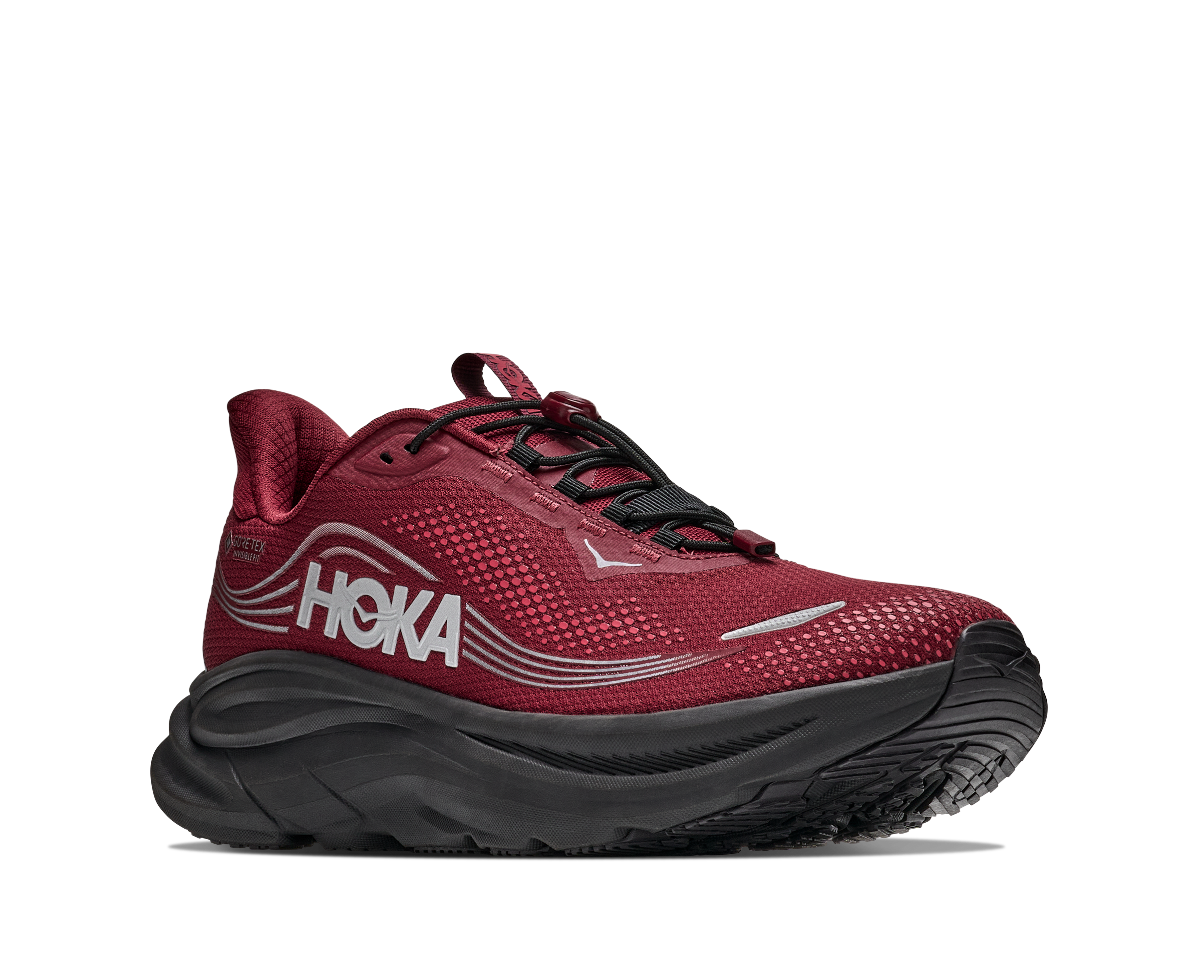 Red running shoe with black sole on a white background