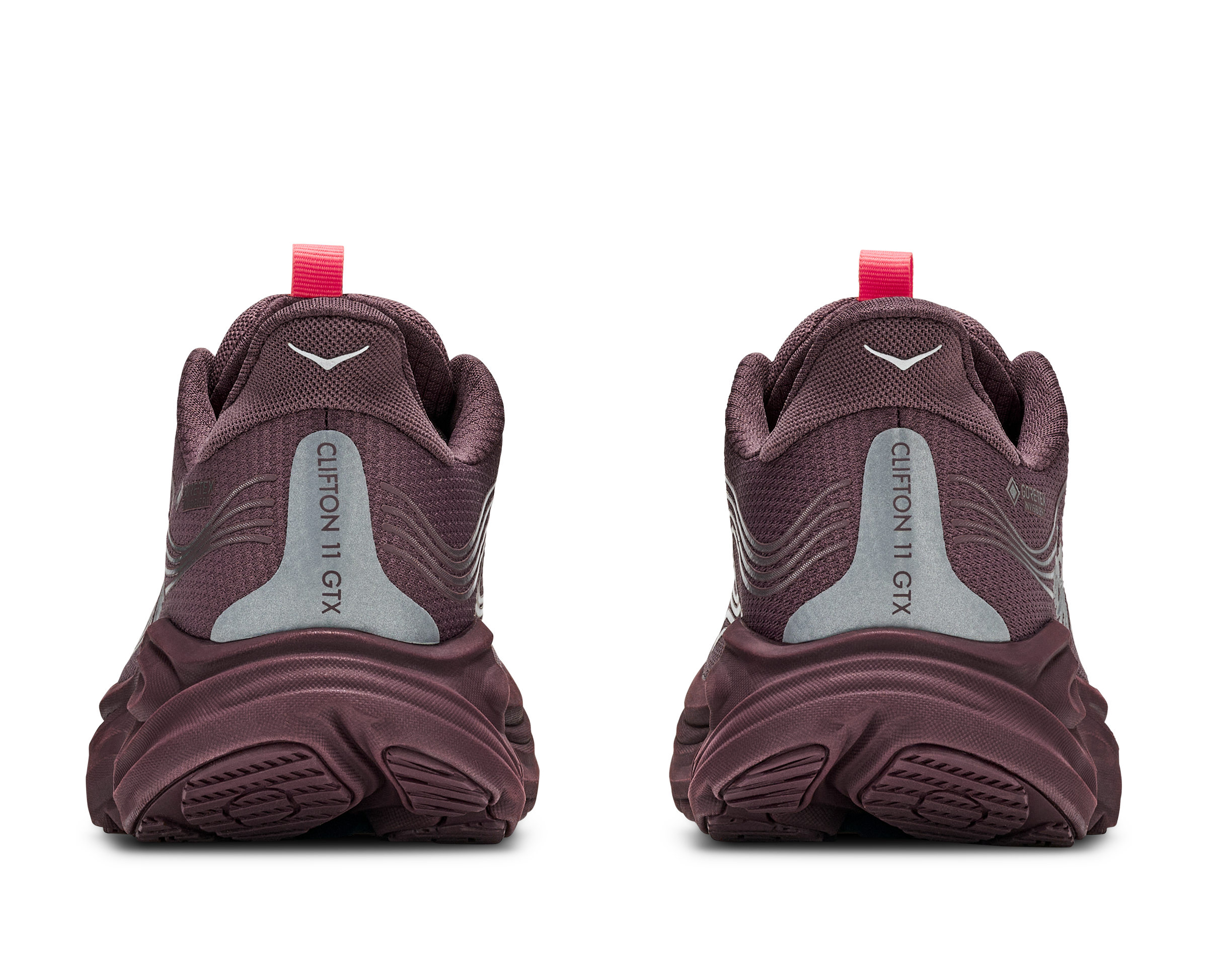 Pair of maroon hiking shoes with visible brand name on a white background