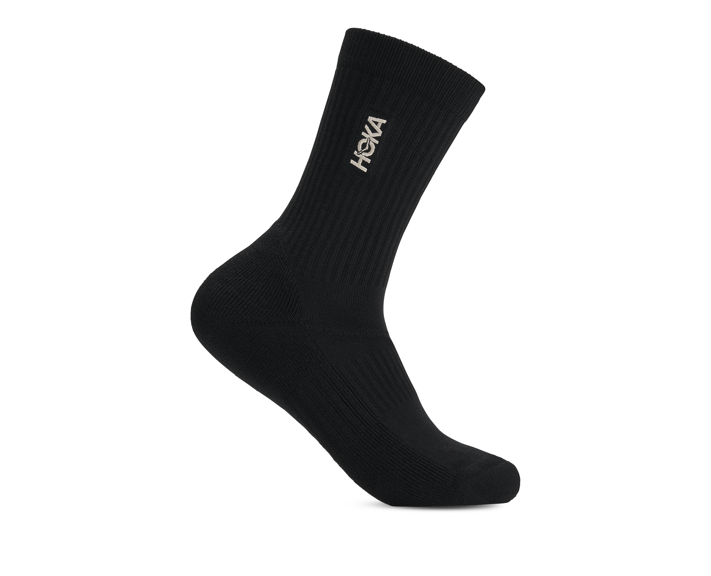 A single black HOKA crew sock with a white logo, shown floating against a solid white background.