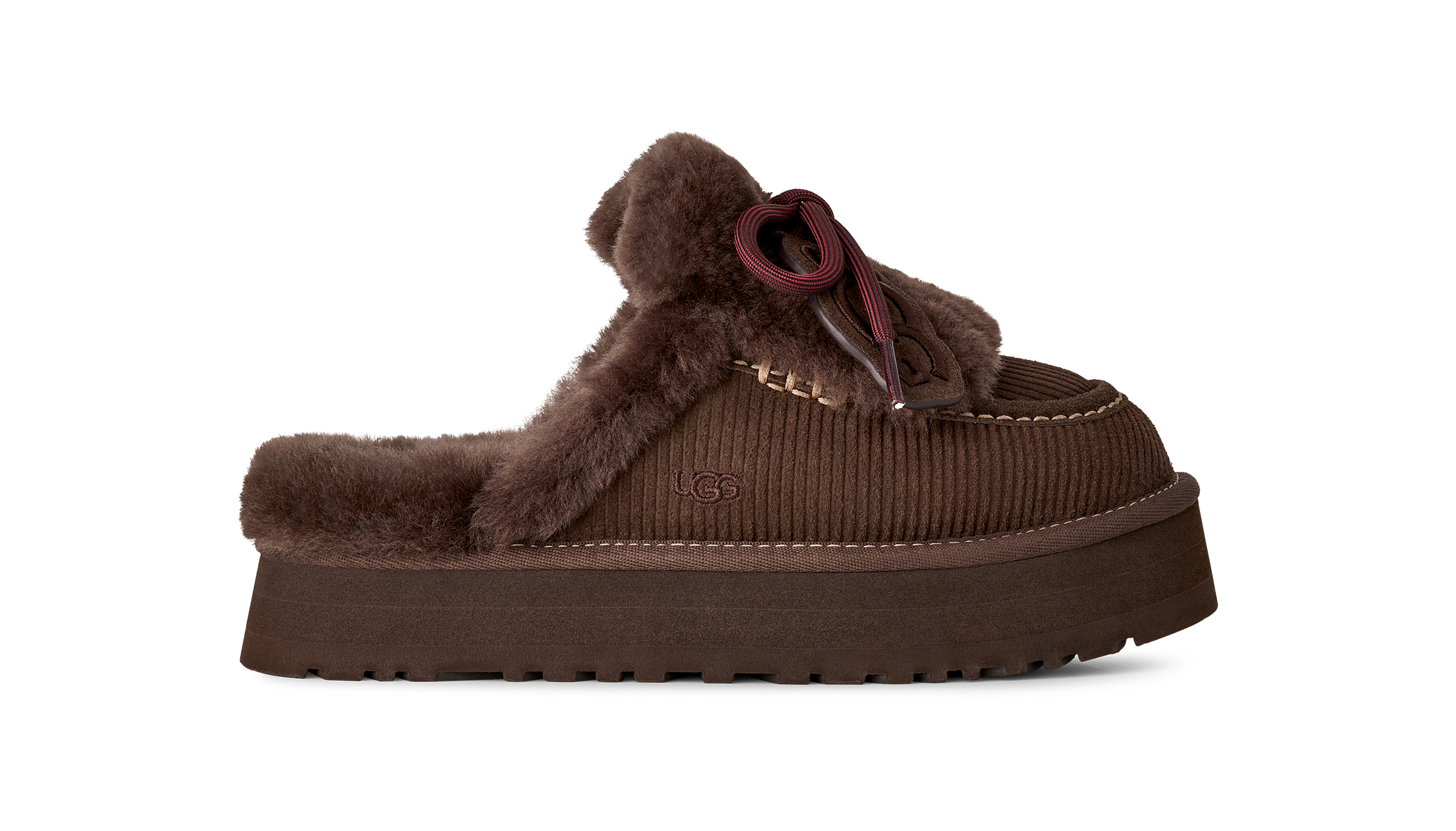 Brown slipper with fur trim on a white background