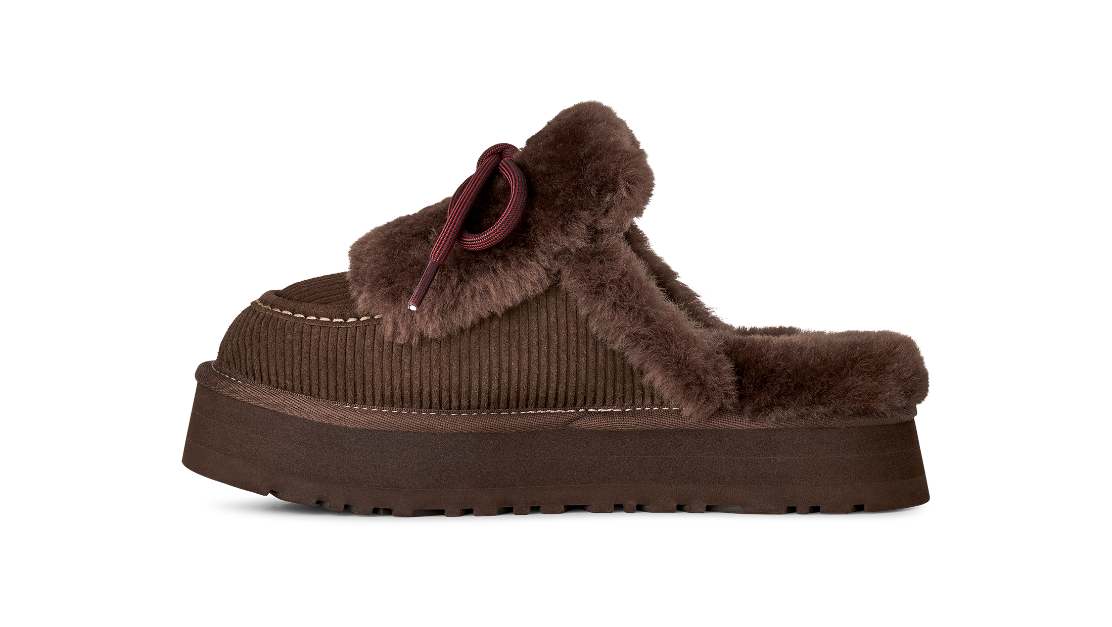 Brown slipper with fur trim on a white background
