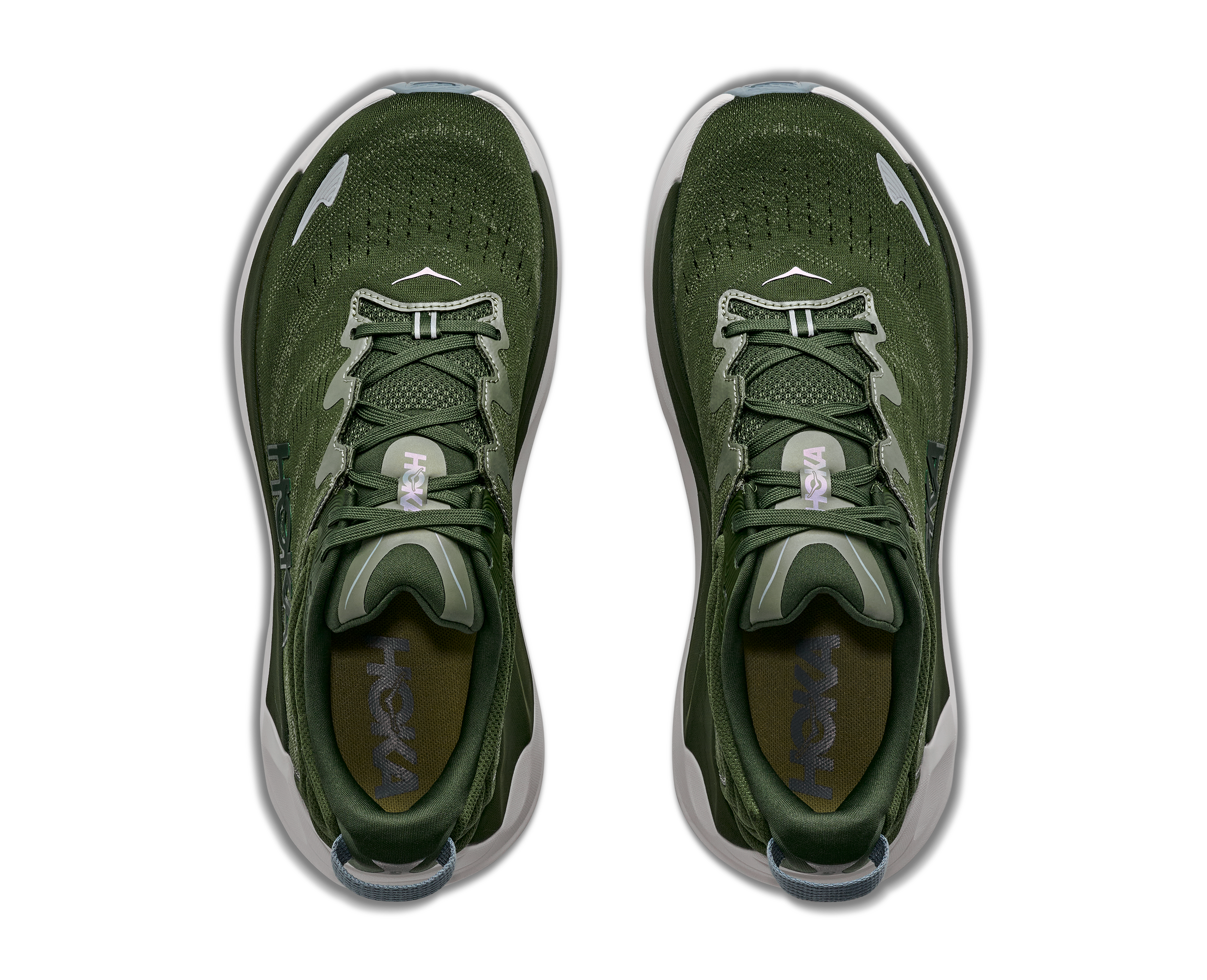 Green athletic shoes with white accents on a white background