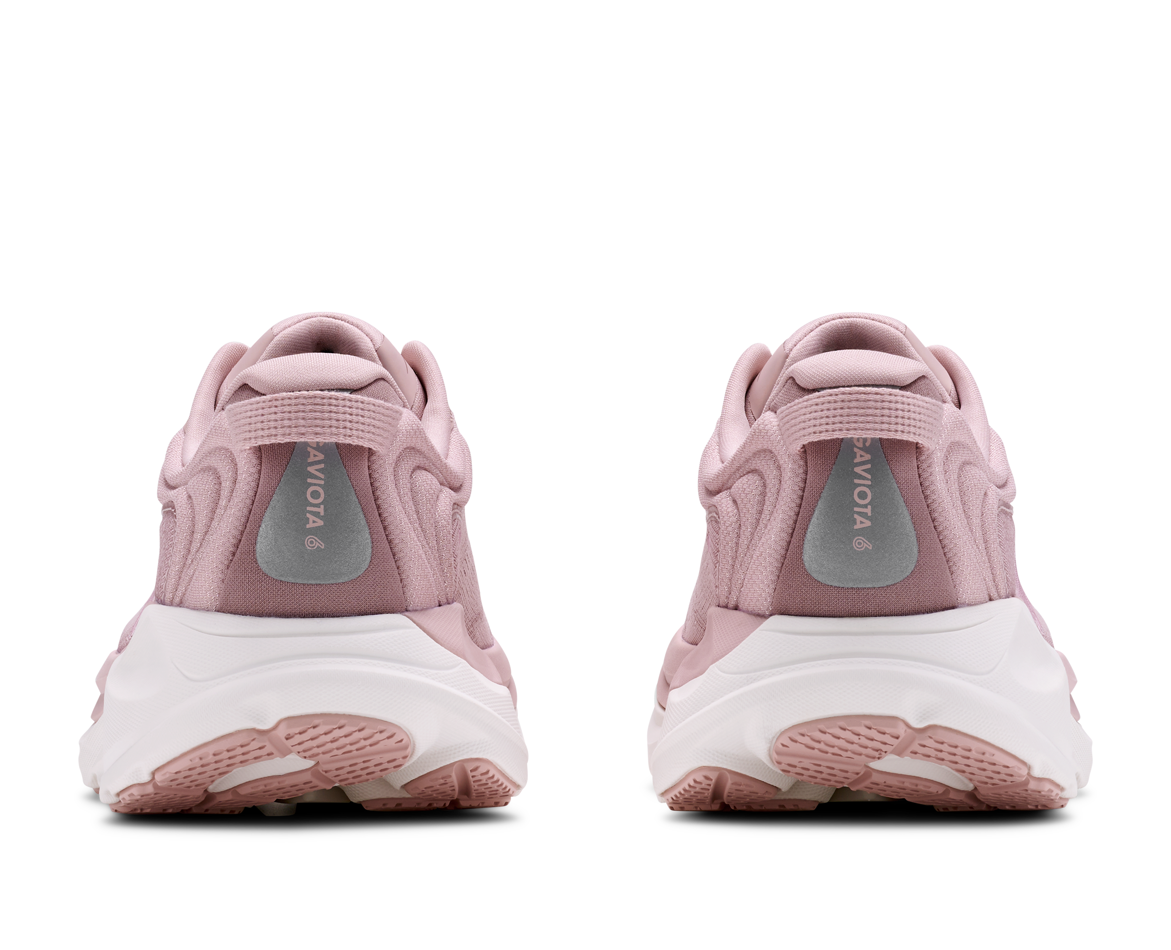 Pair of pink sneakers with white soles on a white background