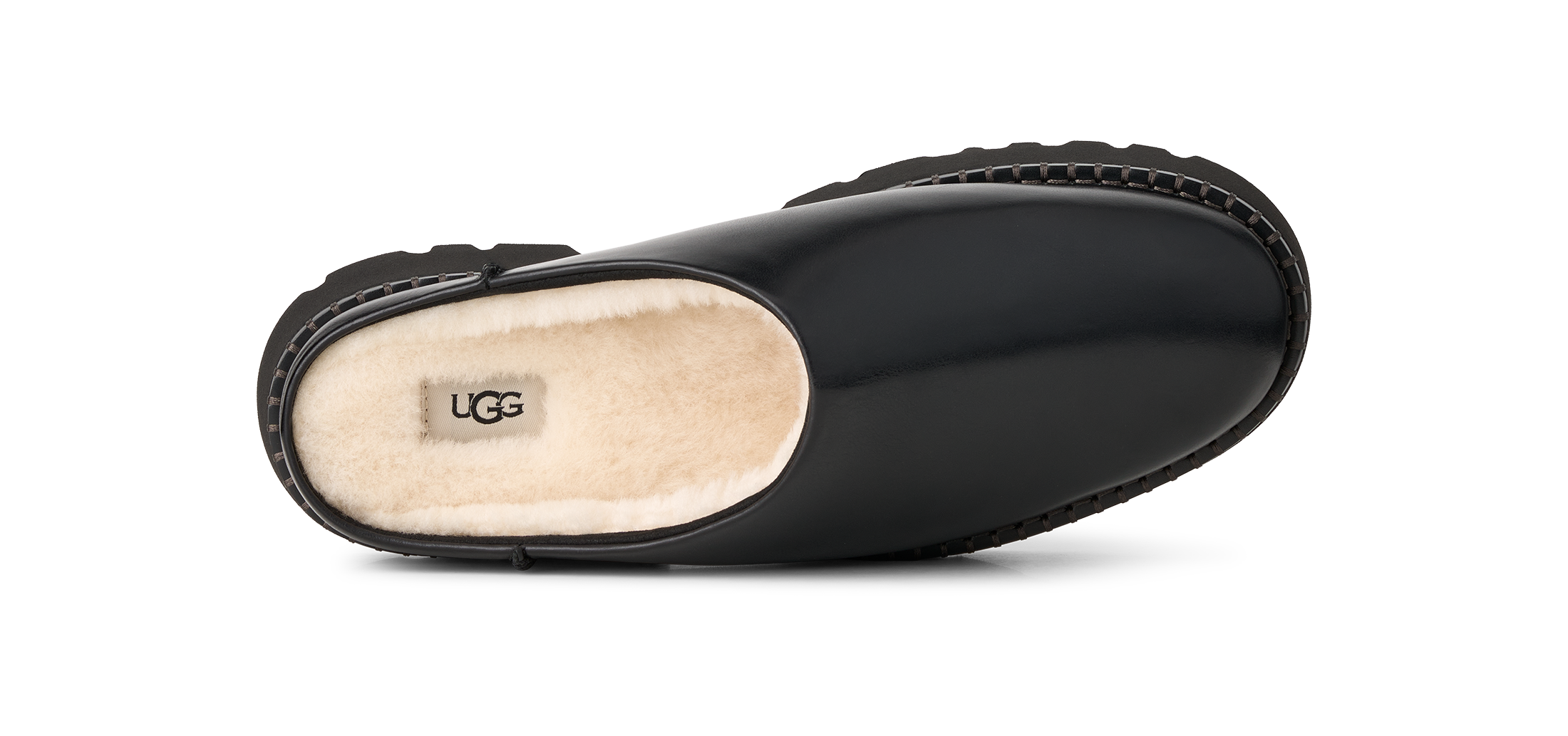 A single black UGG clog shoe with a cream shearling lining, shown from a side profile view on a white background.