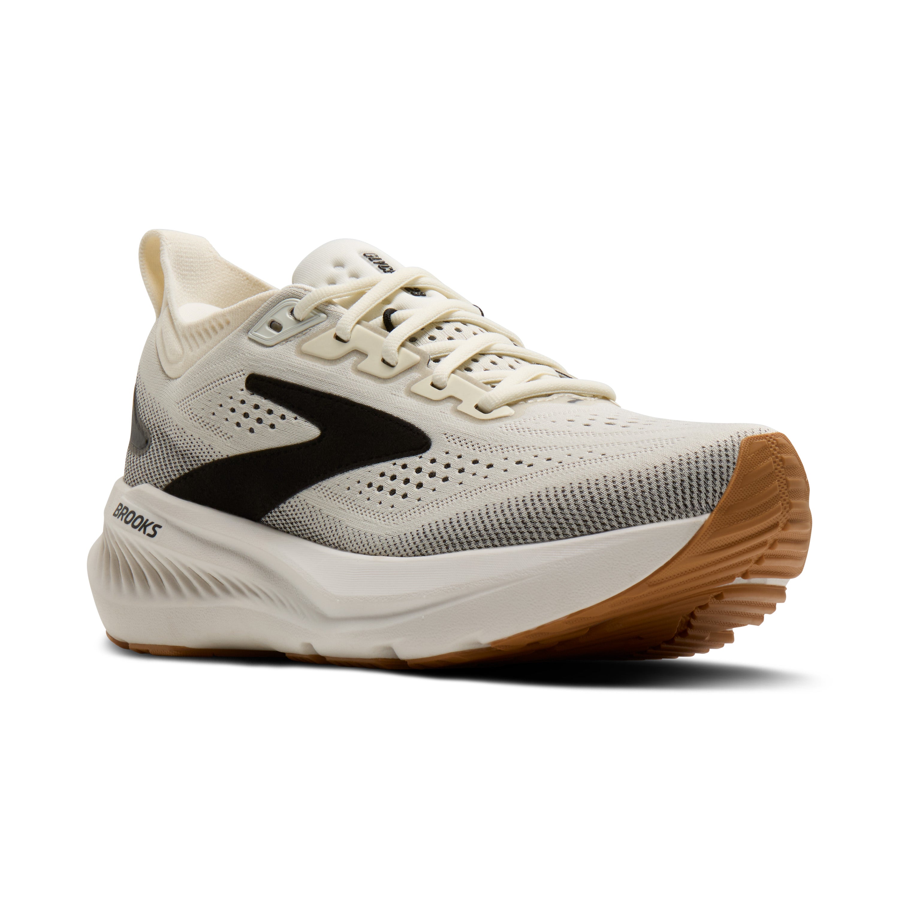 White running shoe with brown sole on a white background