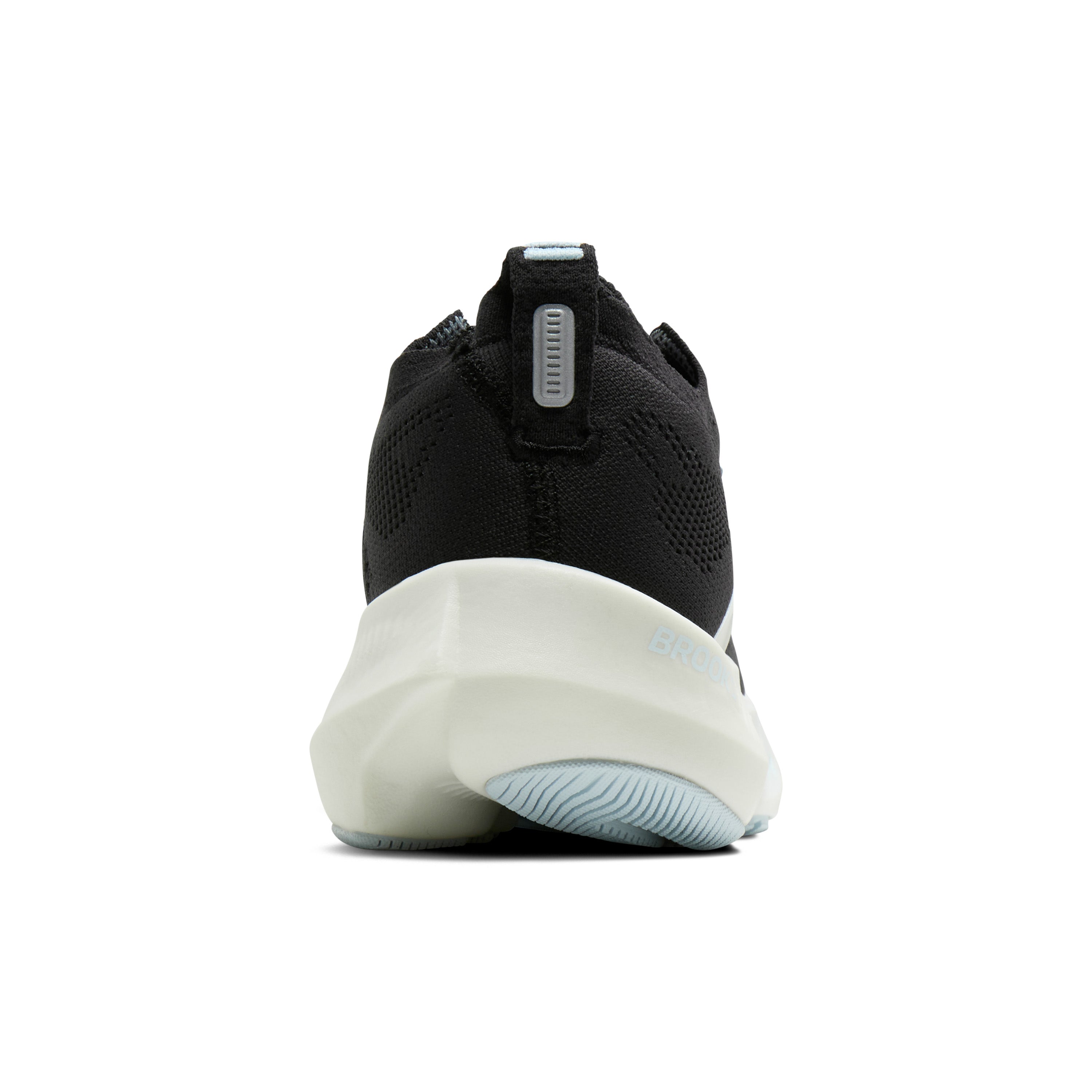 Black athletic shoe with a white sole on a white background
