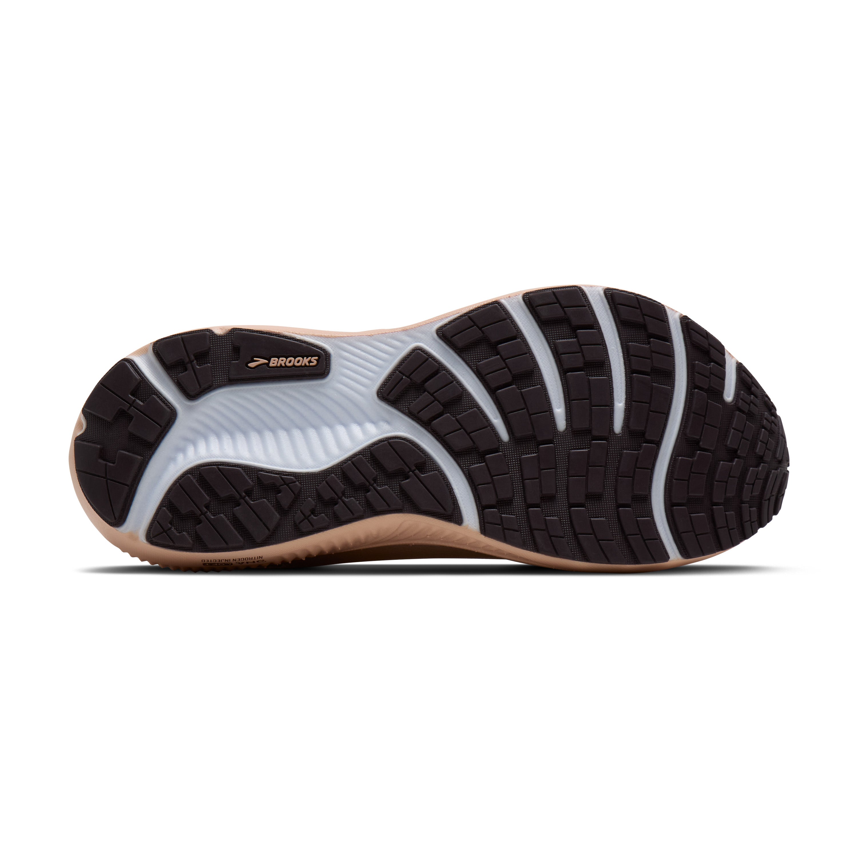 The outsole of a Brooks running shoe, showing a black and white tread pattern with a light tan/gum edge, on a white background.