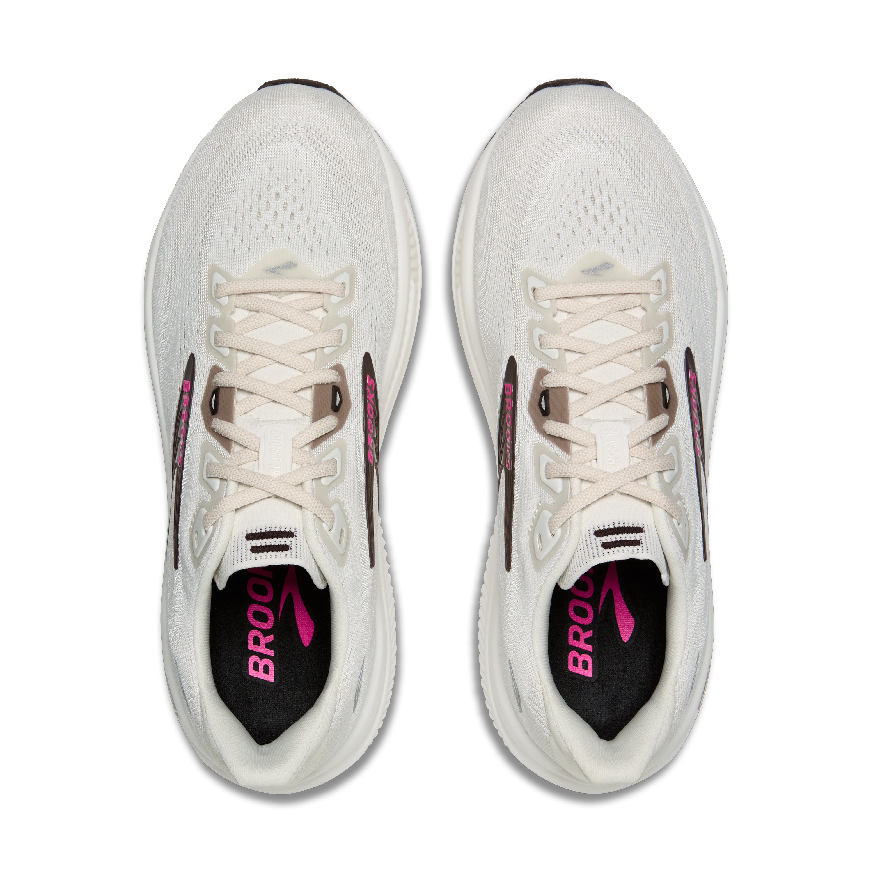 White running shoes with pink and black accents on a white background