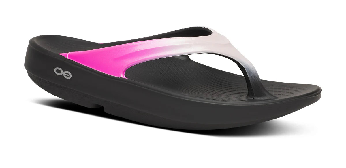Black and pink sandal on a white background