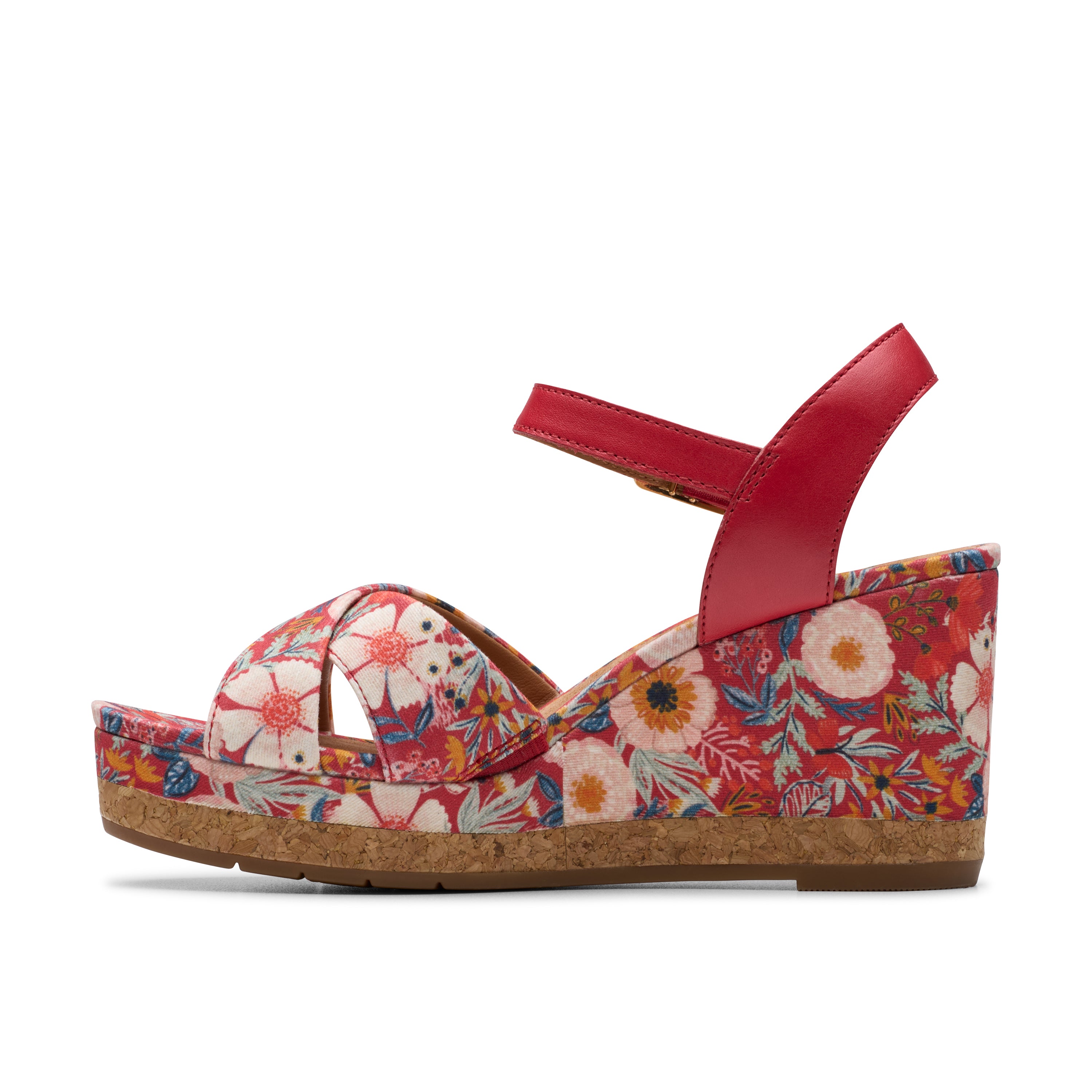Floral wedge sandal with a red strap on a white background