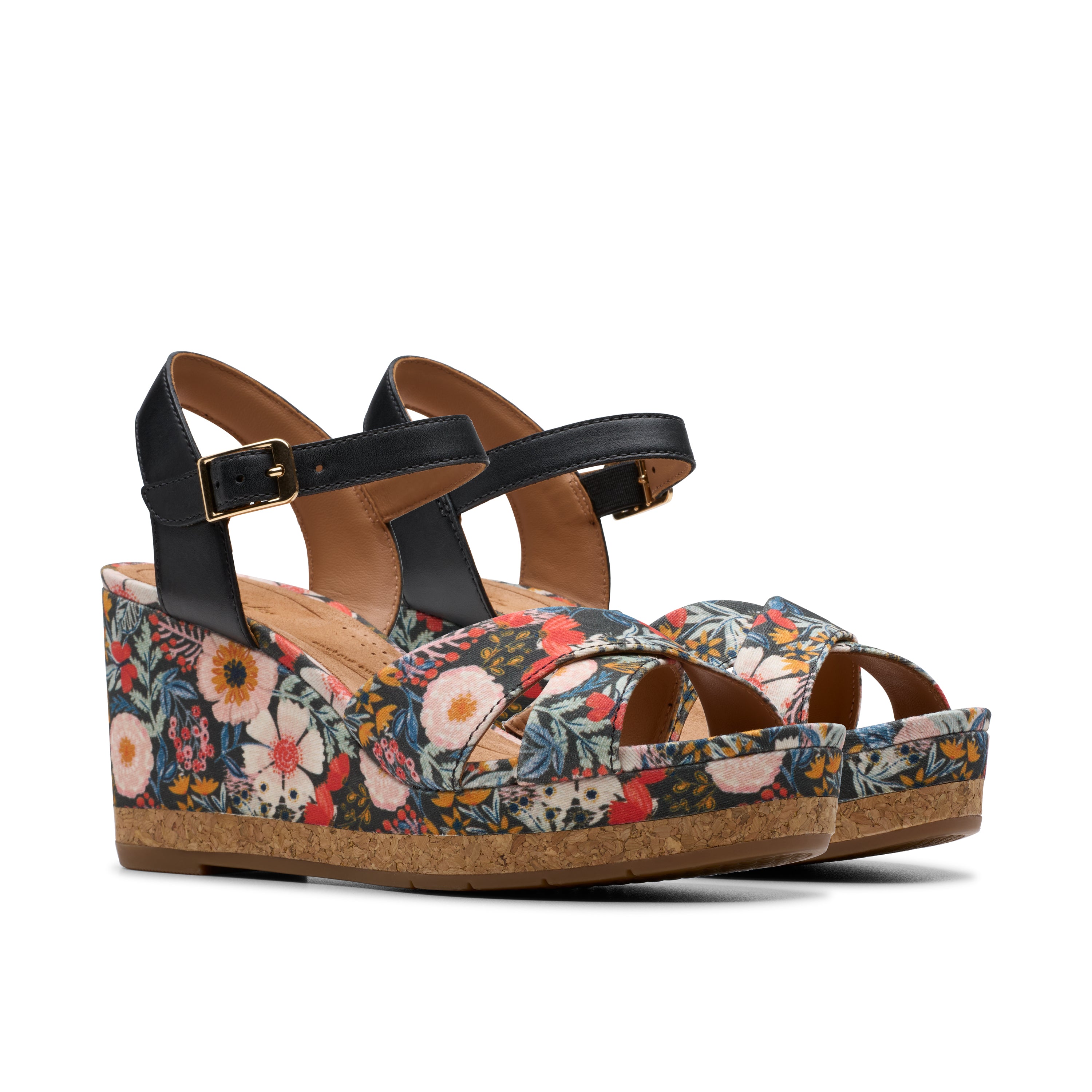 Floral wedge sandals with cork sole on a white background