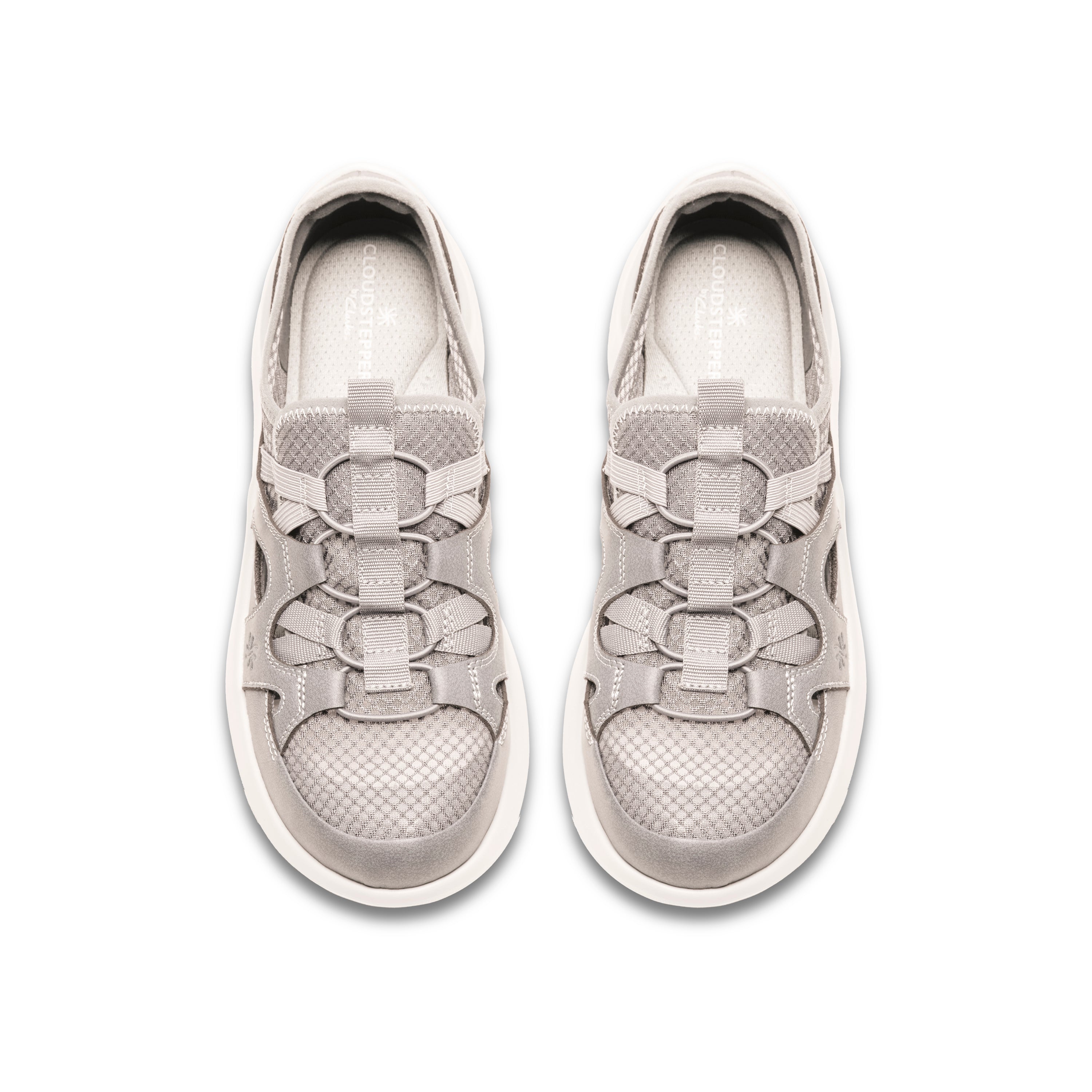 Pair of gray slip-on sneakers with a checkered pattern on a white background