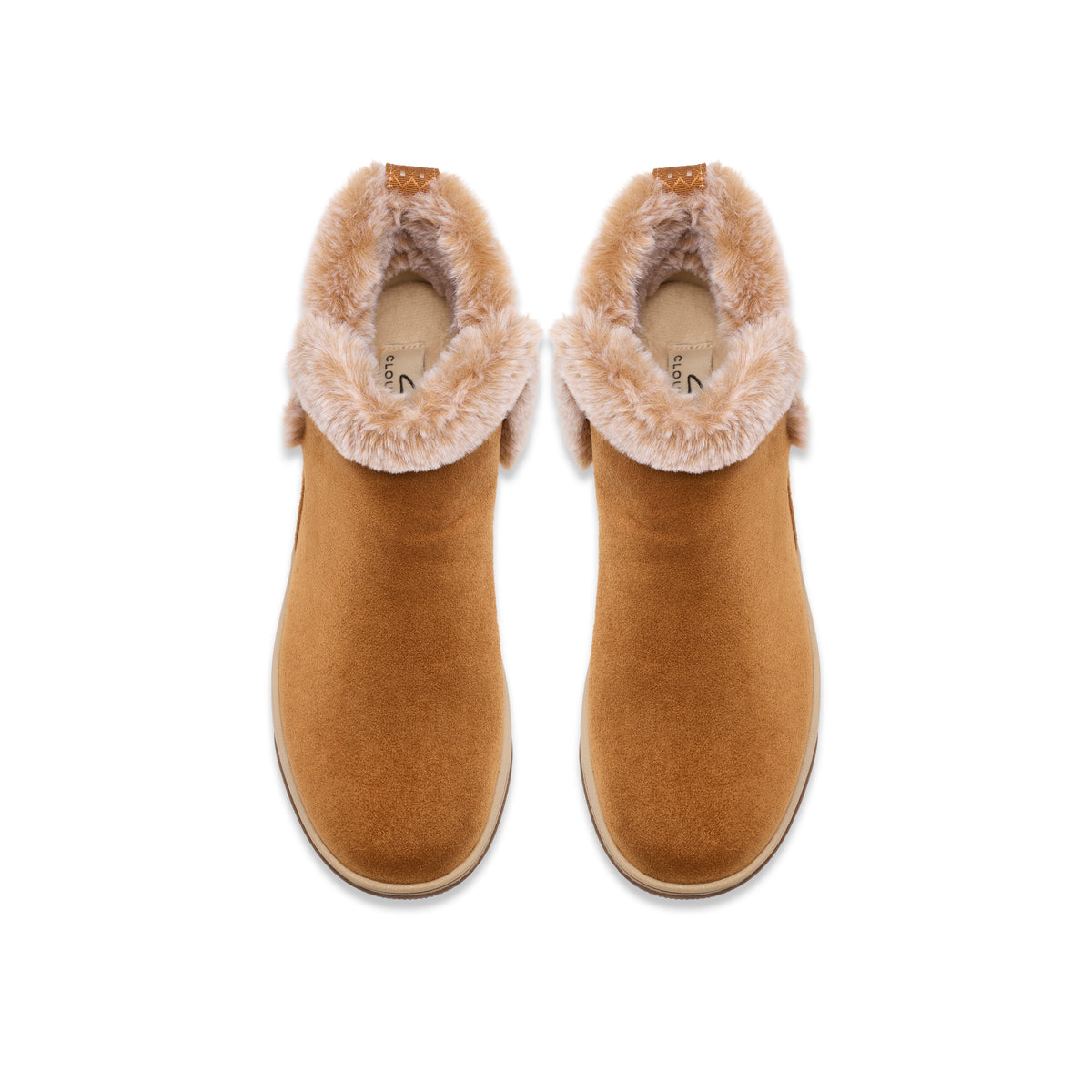 A pair of tan suede ankle boots with fluffy cream shearling lining, shown from a top-down view on a white background.