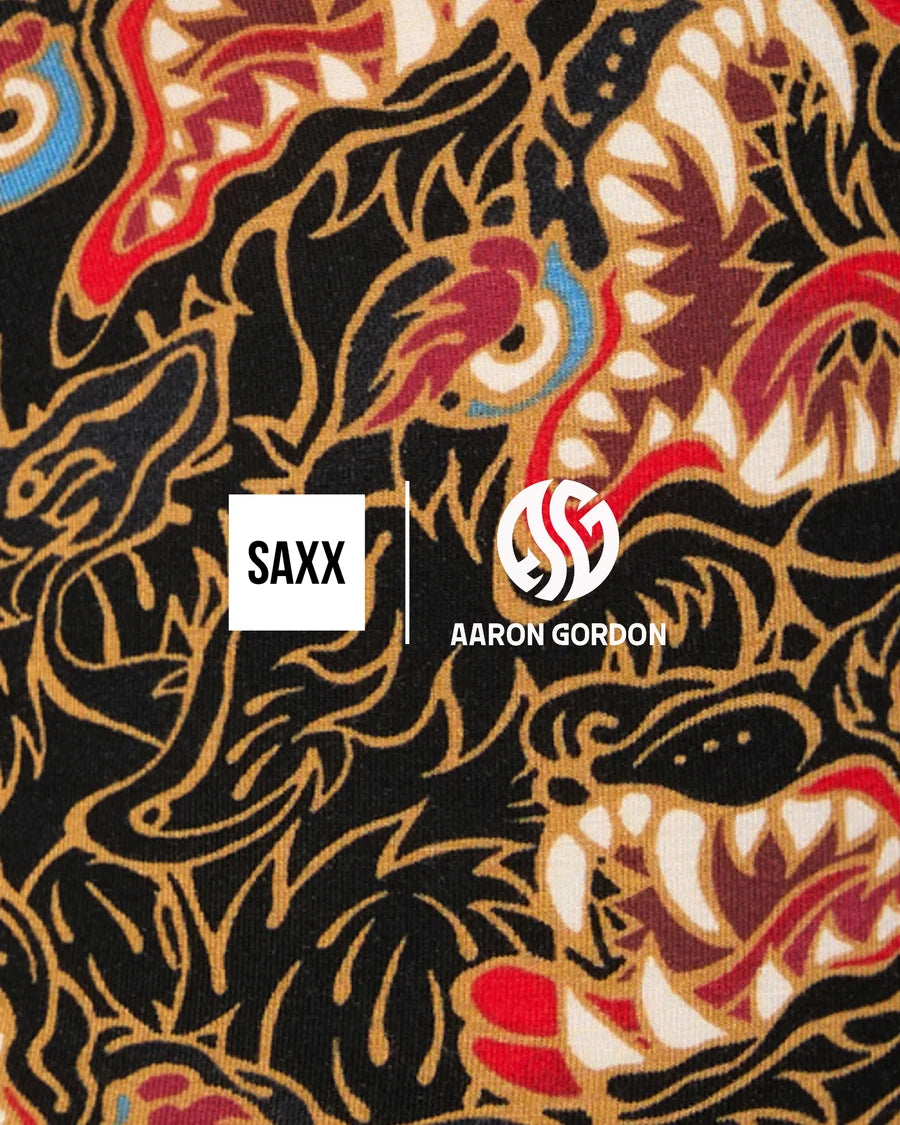 Patterned fabric with SAXX and Aaron Gordon logos.