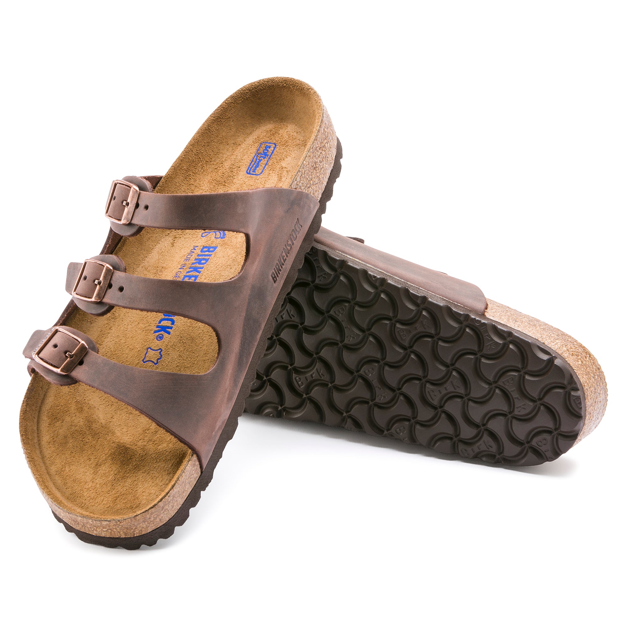 Brown sandals with cork insole on a white background