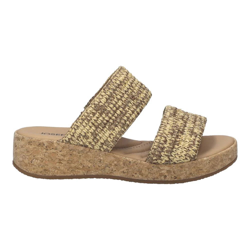 Beige woven sandal with cork sole on a white background