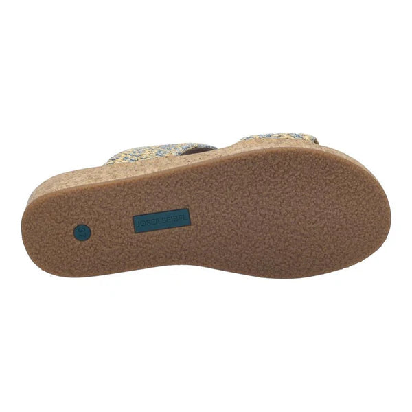 Cork sandal sole with a brand label on a white background