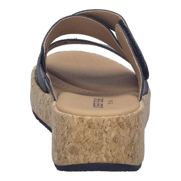 Wedge sandal with cork sole on a white background