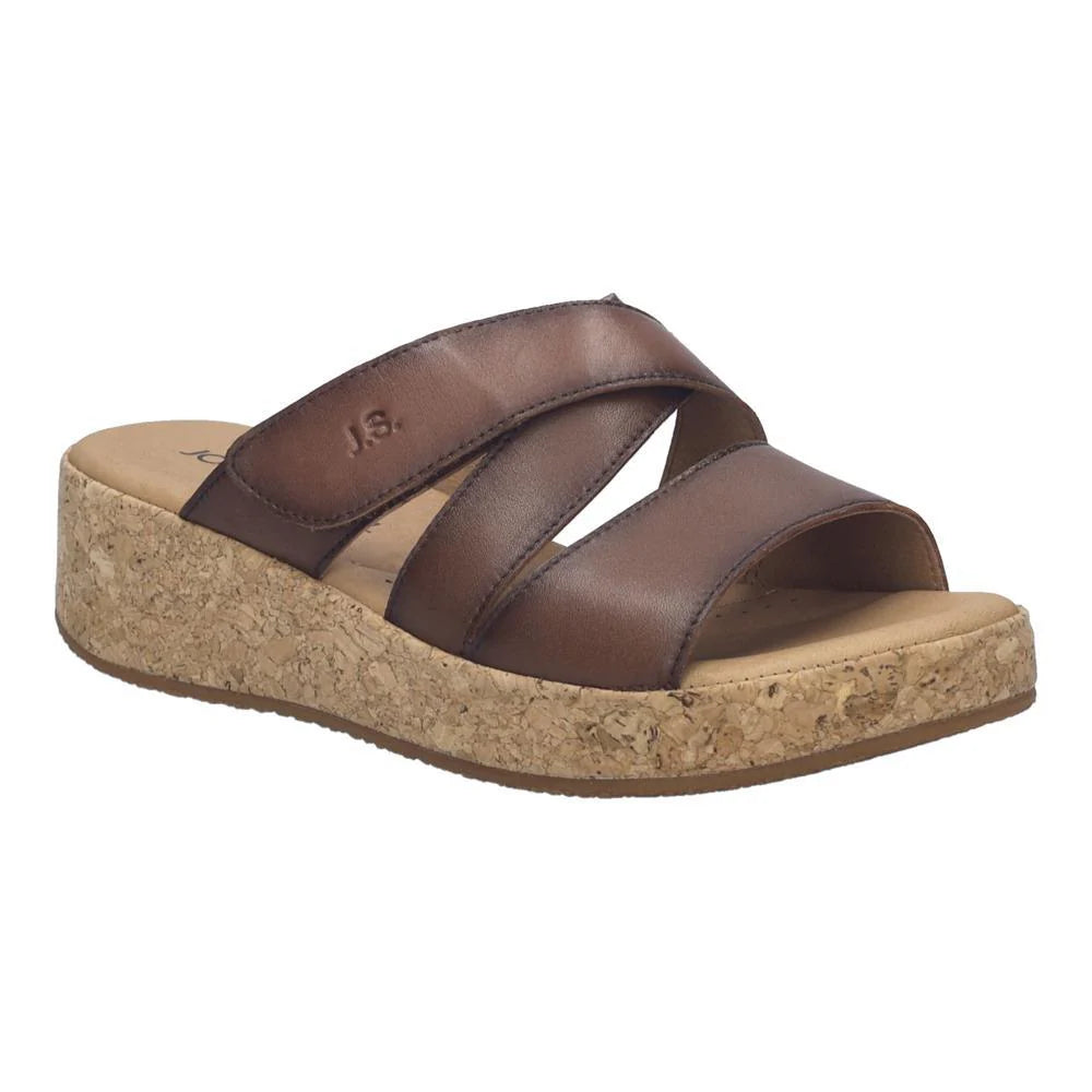 Brown sandal with cork sole on a white background