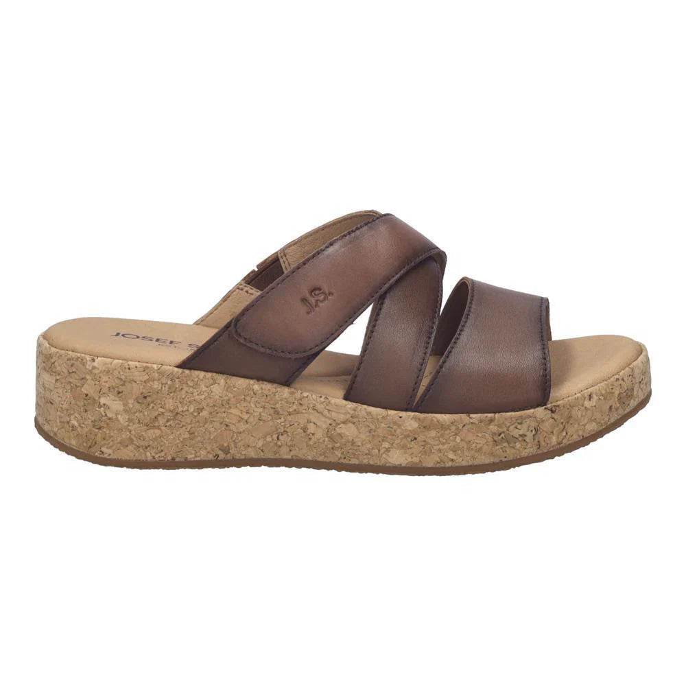 Brown sandal with cork sole on a white background