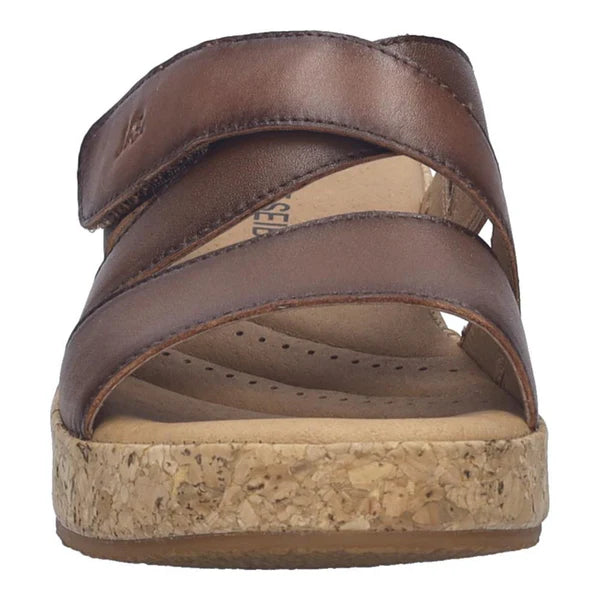 Brown sandal with cork sole on a white background