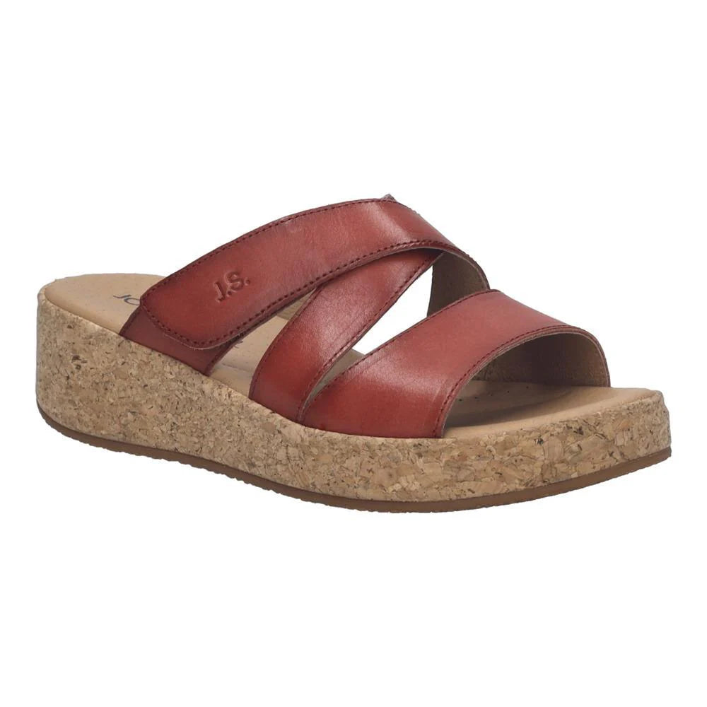 red sandal with cork sole on a white background
