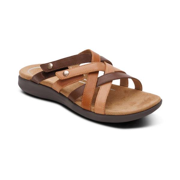 Brown sandal with crisscross straps on a white background