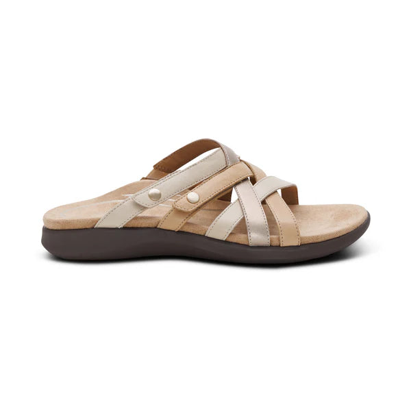 Beige sandal with brown sole on a white background