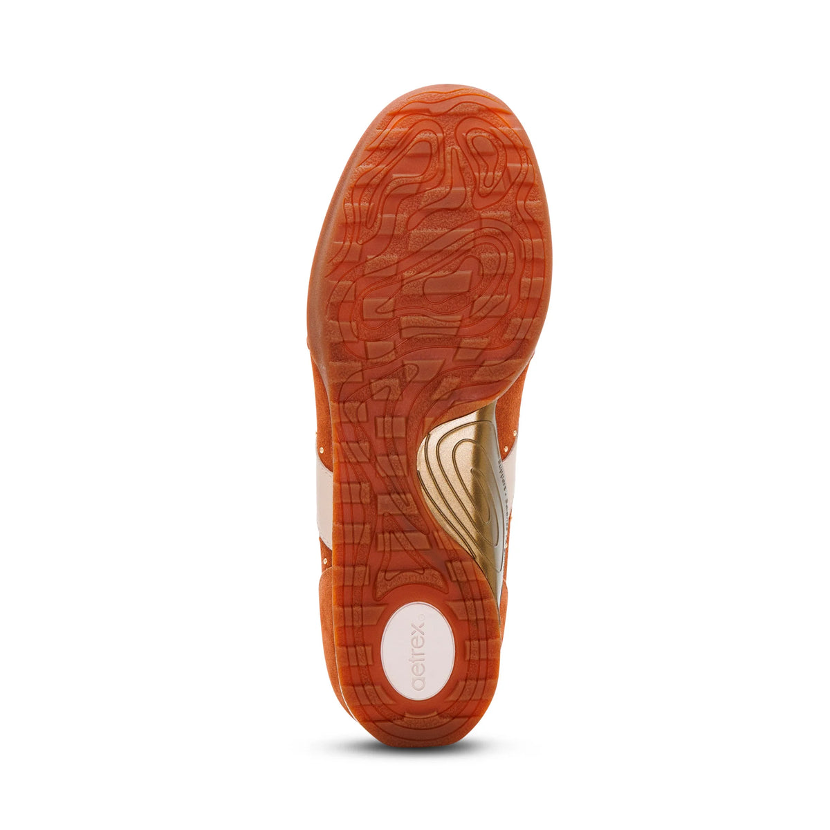 Orange sole of a shoe with brand logo on a white background