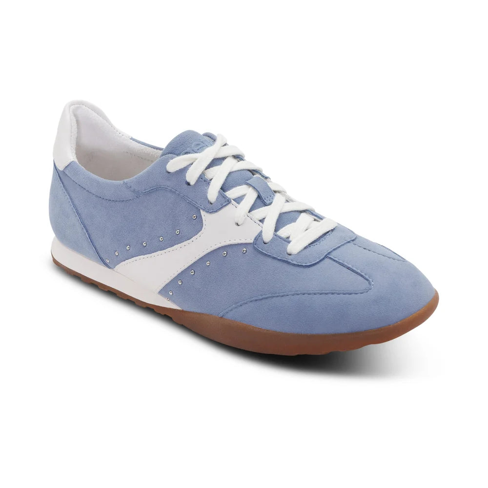 Blue sneaker with white laces on a white background