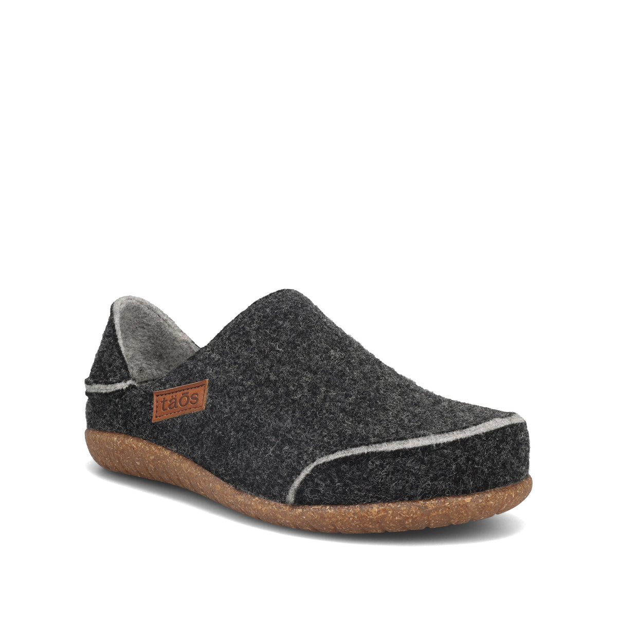 Dark gray slip-on shoe with a brown sole on a white background