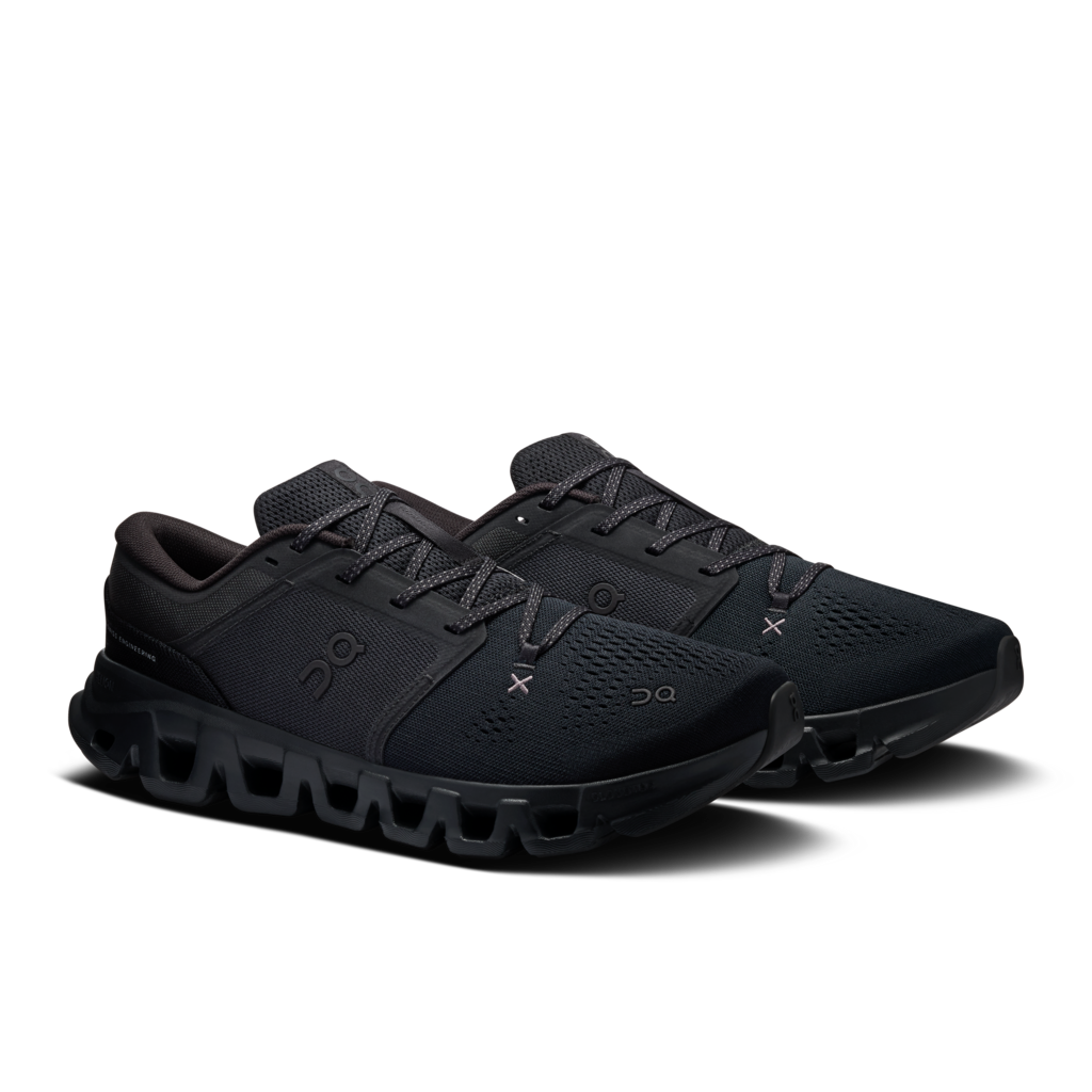 A pair of black On Cloudrunner sneakers shown from a three-quarters angle against a clean white background.
