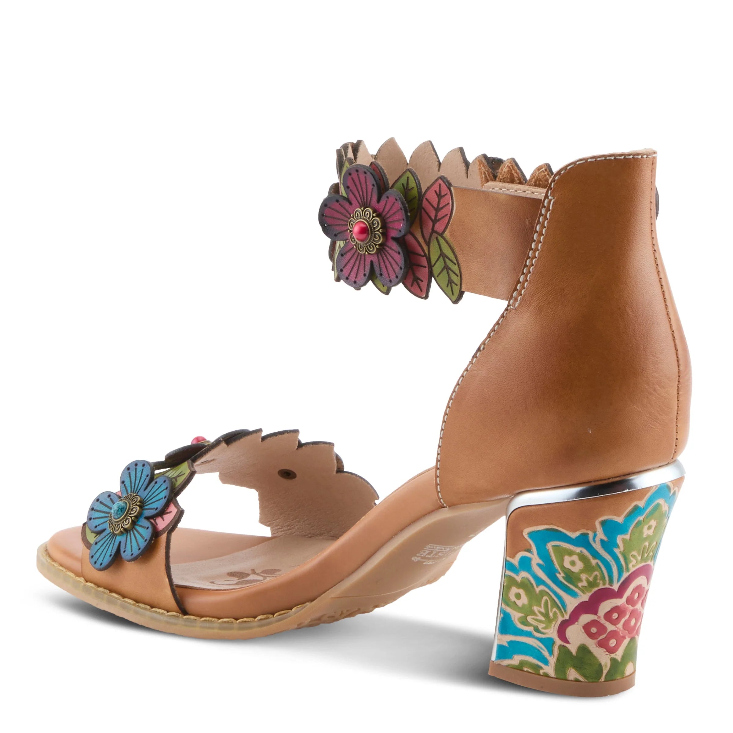 Tan sandal with floral decorations on a white background