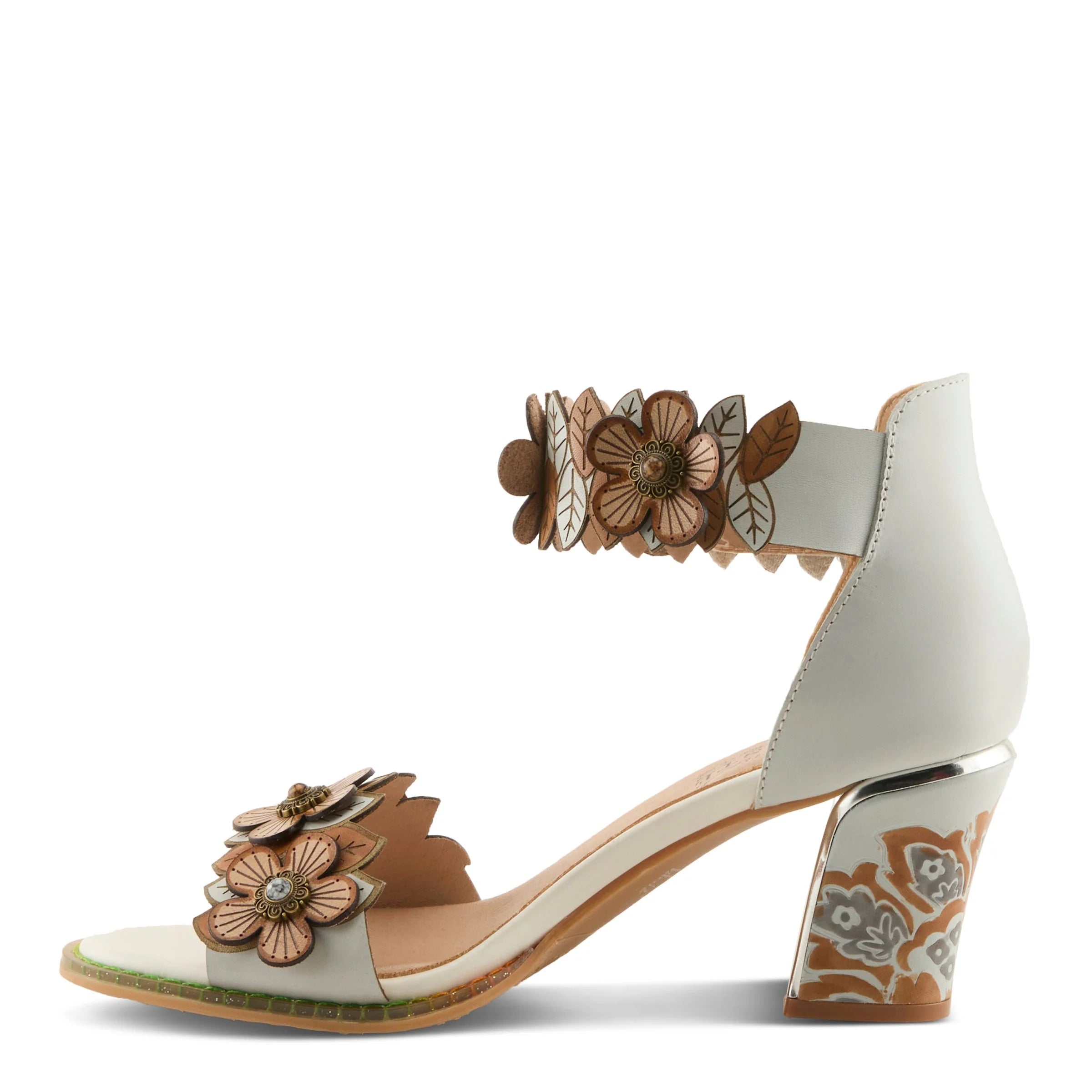 White sandal with floral decorations on a white background